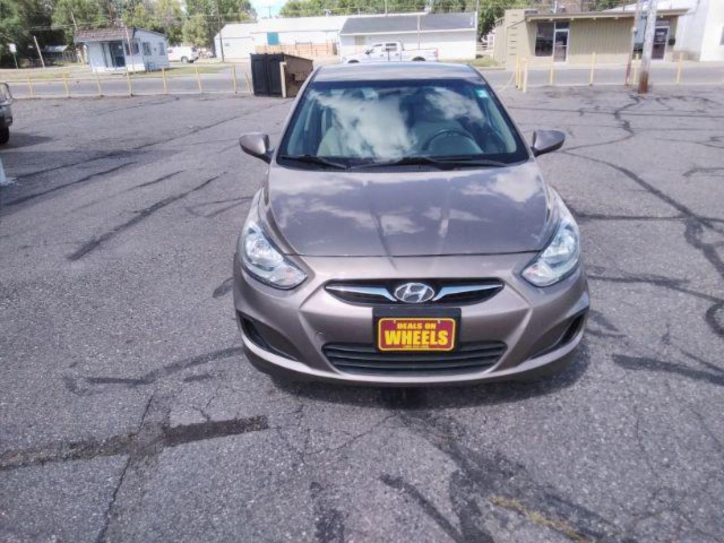 2012 Hyundai Accent GLS 4-Door (KMHCT4AE1CU) with an 1.6L L4 DOHC 16V engine, located at 4047 Montana Ave., Billings, MT, 59101, 45.770847, -108.529800 - Photo#2