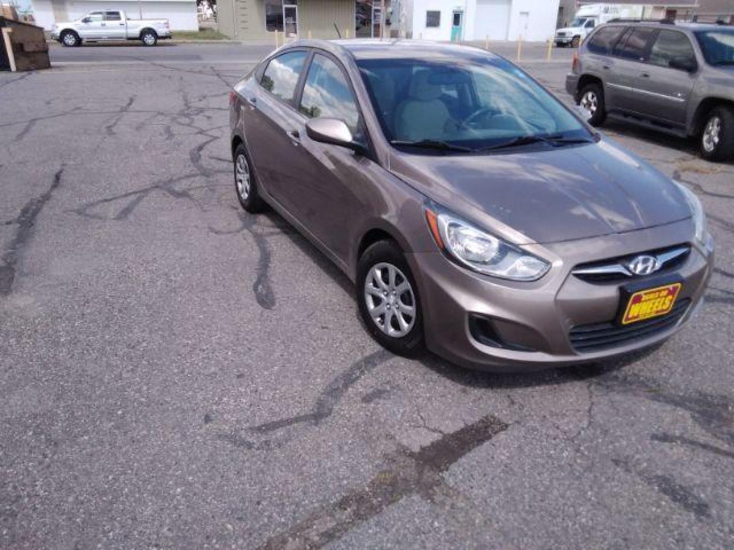 2012 Hyundai Accent GLS 4-Door (KMHCT4AE1CU) with an 1.6L L4 DOHC 16V engine, located at 4047 Montana Ave., Billings, MT, 59101, 45.770847, -108.529800 - Photo#3