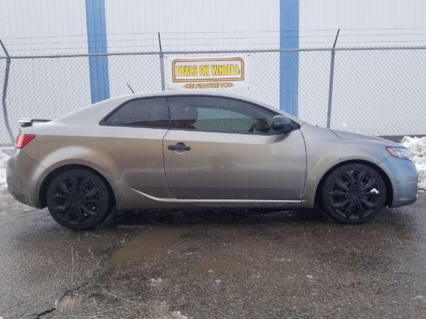 2012 Kia Forte Koup SX (KNAFW6A30C5) with an 2.4L L4 DOHC 16V engine, located at 601 E. Idaho St., Kalispell, MT, 59901, (406) 300-4664, 0.000000, 0.000000 - Photo#3