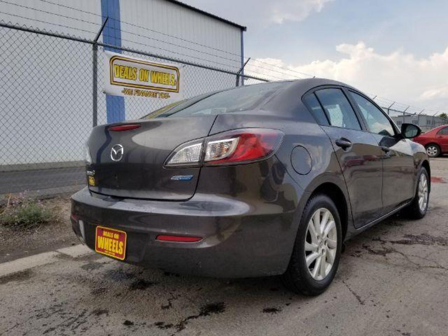 2012 Mazda MAZDA3 i Touring 4-Door (JM1BL1V86C1) with an 2.0L L4 DOHC 16V engine, located at 4047 Montana Ave., Billings, MT, 59101, 45.770847, -108.529800 - Photo#4