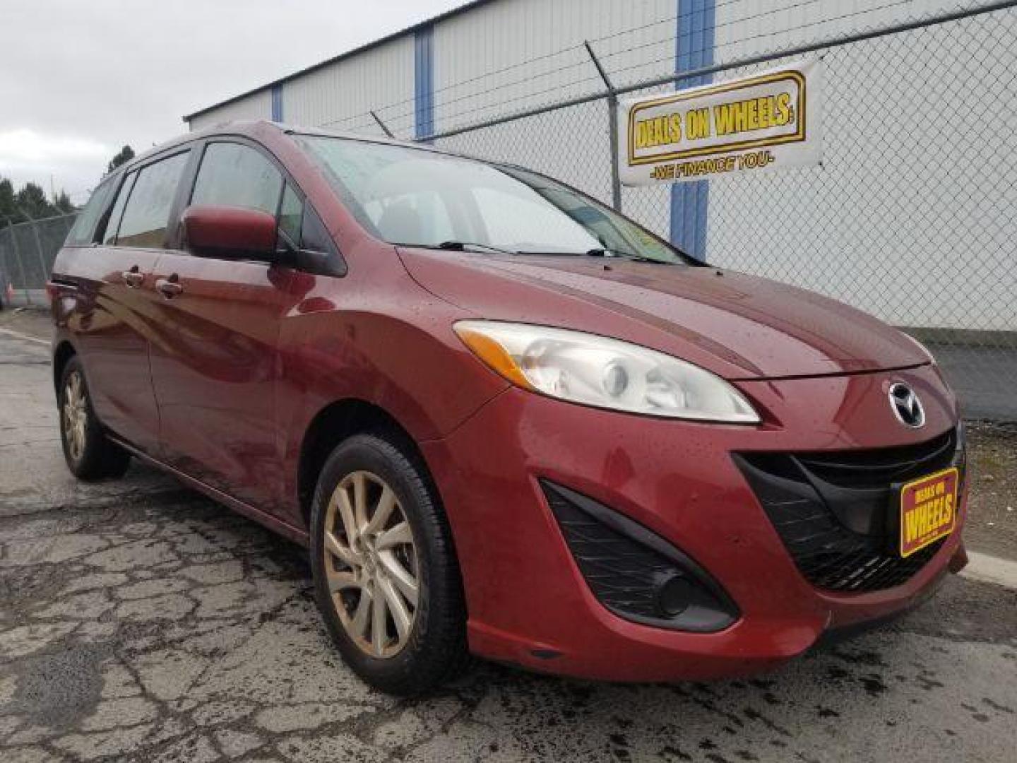 2012 Mazda MAZDA5 Sport (JM1CW2BL8C0) with an 2.5L L4 DOHC 16V engine, located at 601 E. Idaho St., Kalispell, MT, 59901, (406) 300-4664, 0.000000, 0.000000 - Photo#2