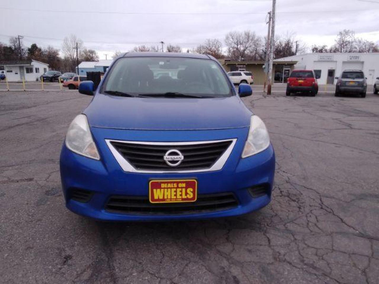 2012 Nissan Versa 1.6 SV Sedan (3N1CN7AP3CL) with an 1.6L L4 DOHC 16V engine, located at 4047 Montana Ave., Billings, MT, 59101, 45.770847, -108.529800 - Photo#2