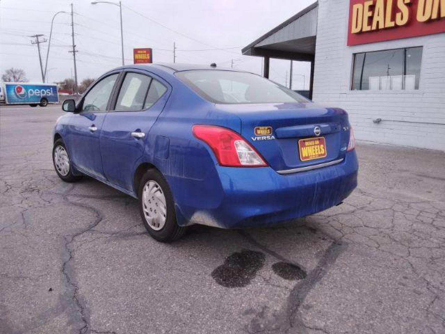 2012 Nissan Versa 1.6 SV Sedan (3N1CN7AP3CL) with an 1.6L L4 DOHC 16V engine, located at 4047 Montana Ave., Billings, MT, 59101, 45.770847, -108.529800 - Photo#7