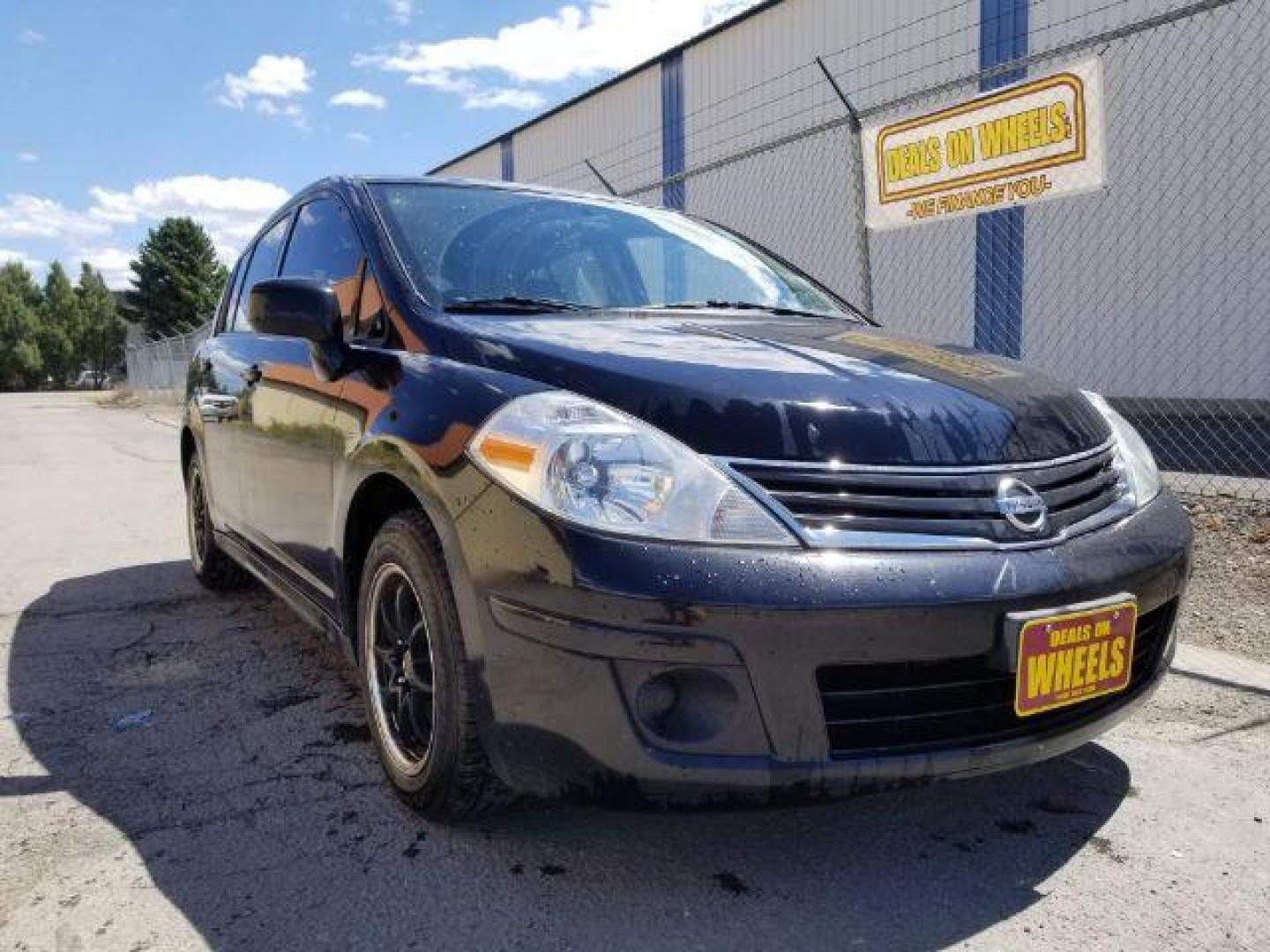 2012 Nissan Versa 1.8 SL Hatchback (3N1BC1CP7CK) with an 1.8L L4 DOHC 16V engine, Continuously Variable Transmission transmission, located at 4047 Montana Ave., Billings, MT, 59101, 45.770847, -108.529800 - Photo#6