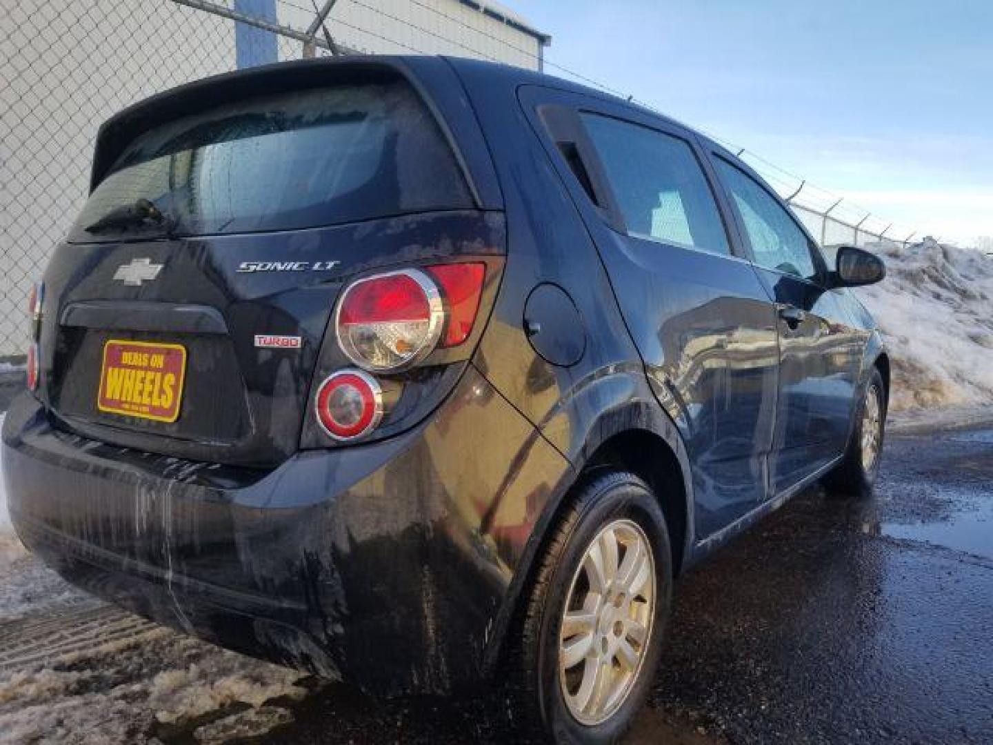 2013 Chevrolet Sonic LT Auto 5-Door (1G1JC6SB8D4) with an 1.4L L4 DOHC 24V TURBO engine, 6-Speed Automatic transmission, located at 4801 10th Ave S,, Great Falls, MT, 59405, 0.000000, 0.000000 - Photo#4