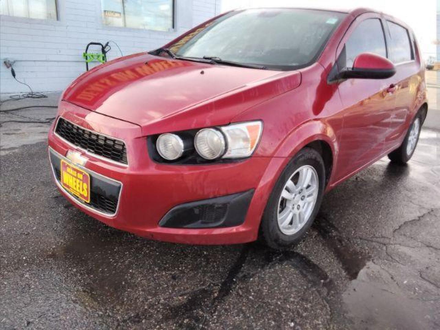 2013 Chevrolet Sonic LT Auto 5-Door (1G1JC6SB3D4) with an 1.4L L4 DOHC 24V TURBO engine, 6-Speed Automatic transmission, located at 4047 Montana Ave., Billings, MT, 59101, 45.770847, -108.529800 - Photo#0