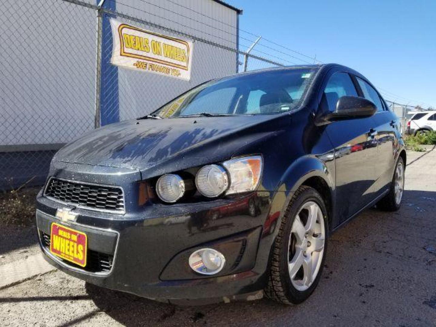 2013 Chevrolet Sonic LTZ Auto Sedan (1G1JE5SB4D4) with an 1.4L L4 DOHC 24V TUR engine, 6-Speed Automatic transmission, located at 601 E. Idaho St., Kalispell, MT, 59901, (406) 300-4664, 0.000000, 0.000000 - Photo#0