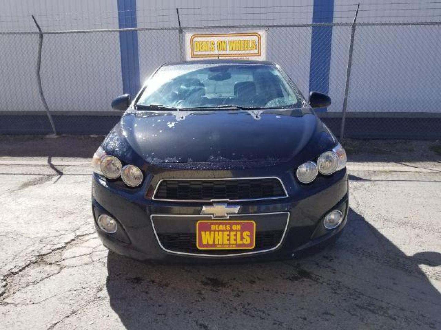 2013 Chevrolet Sonic LTZ Auto Sedan (1G1JE5SB4D4) with an 1.4L L4 DOHC 24V TUR engine, 6-Speed Automatic transmission, located at 601 E. Idaho St., Kalispell, MT, 59901, (406) 300-4664, 0.000000, 0.000000 - Photo#1