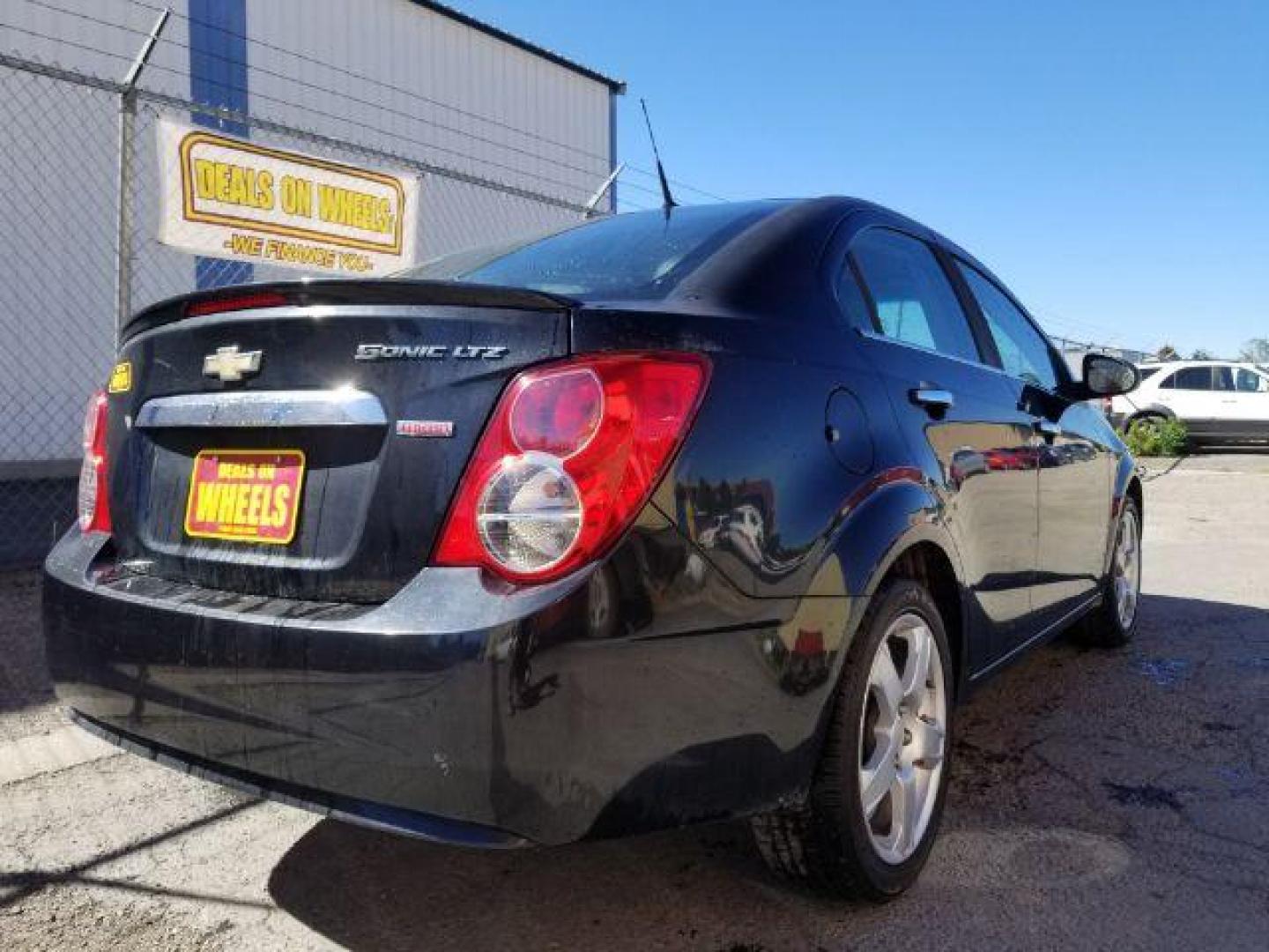 2013 Chevrolet Sonic LTZ Auto Sedan (1G1JE5SB4D4) with an 1.4L L4 DOHC 24V TUR engine, 6-Speed Automatic transmission, located at 601 E. Idaho St., Kalispell, MT, 59901, (406) 300-4664, 0.000000, 0.000000 - Photo#4