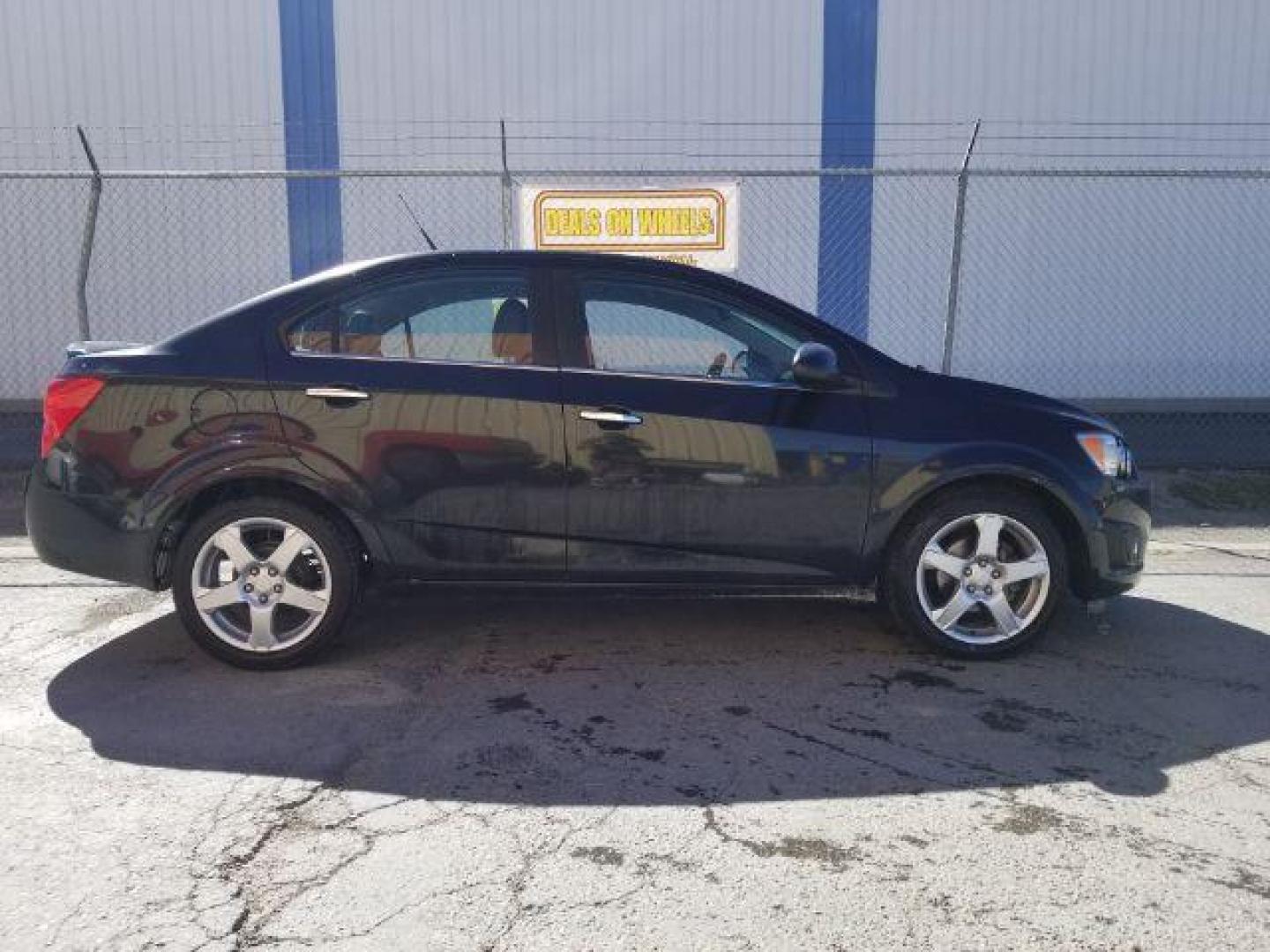 2013 Chevrolet Sonic LTZ Auto Sedan (1G1JE5SB4D4) with an 1.4L L4 DOHC 24V TUR engine, 6-Speed Automatic transmission, located at 601 E. Idaho St., Kalispell, MT, 59901, (406) 300-4664, 0.000000, 0.000000 - Photo#5