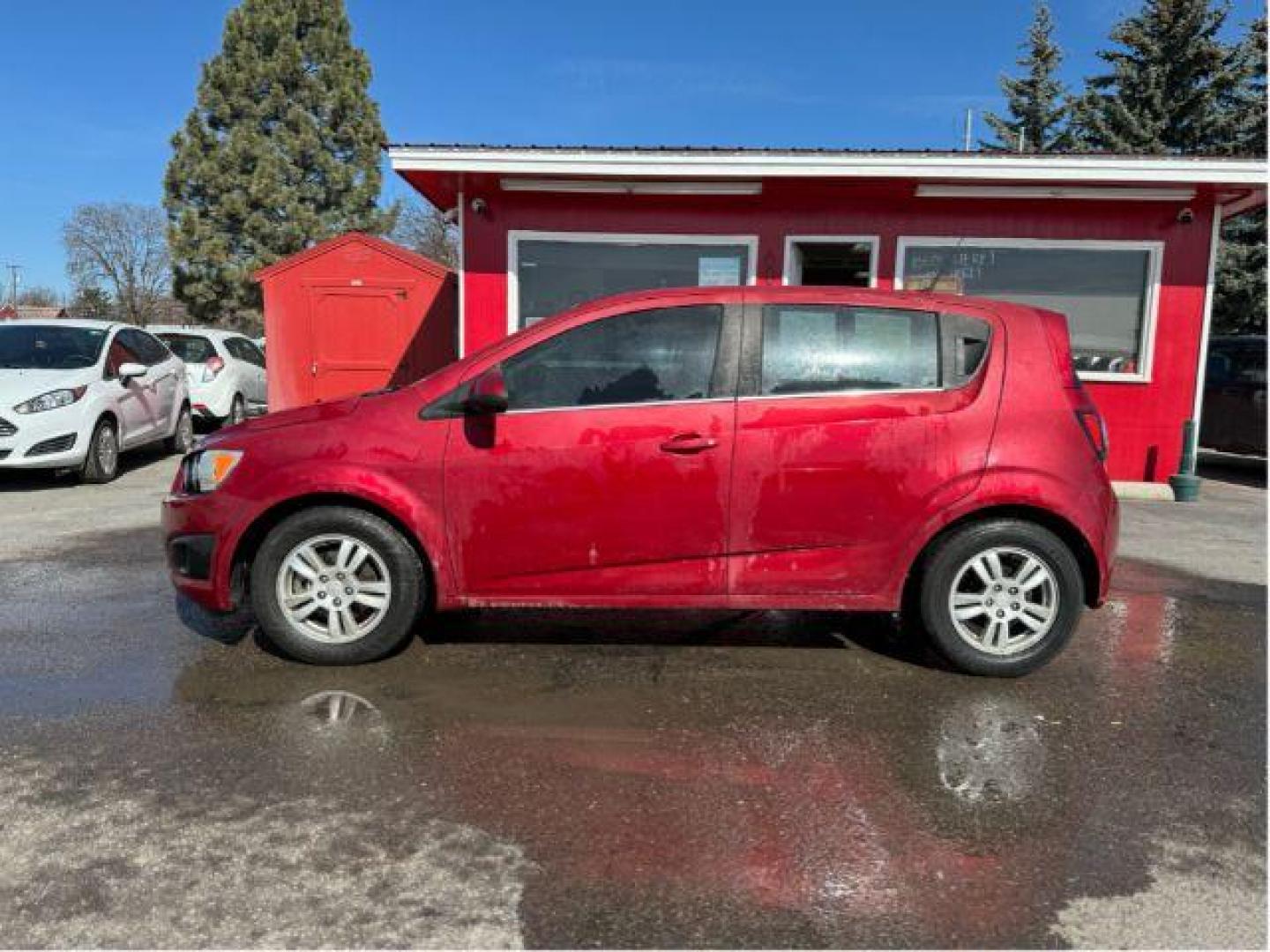 2013 Chevrolet Sonic LT Auto 5-Door (1G1JC6SB7D4) with an 1.4L L4 DOHC 24V TURBO engine, 6-Speed Automatic transmission, located at 601 E. Idaho St., Kalispell, MT, 59901, (406) 300-4664, 0.000000, 0.000000 - Photo#1