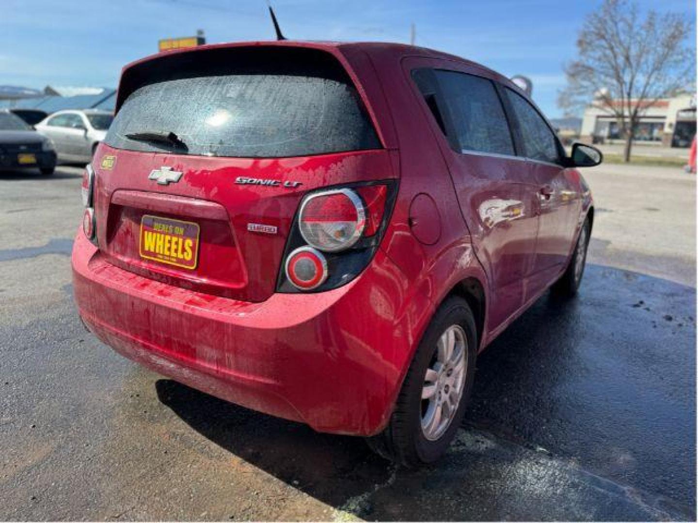 2013 Chevrolet Sonic LT Auto 5-Door (1G1JC6SB7D4) with an 1.4L L4 DOHC 24V TURBO engine, 6-Speed Automatic transmission, located at 601 E. Idaho St., Kalispell, MT, 59901, (406) 300-4664, 0.000000, 0.000000 - Photo#2