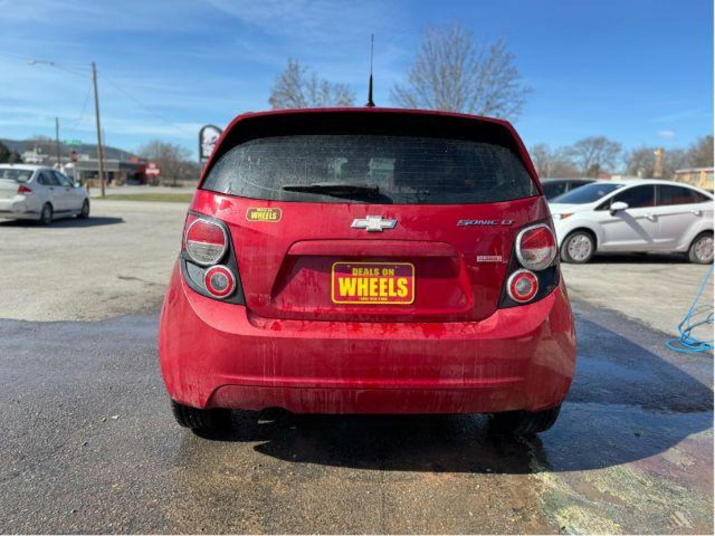 2013 Chevrolet Sonic LT Auto 5-Door (1G1JC6SB7D4) with an 1.4L L4 DOHC 24V TURBO engine, 6-Speed Automatic transmission, located at 601 E. Idaho St., Kalispell, MT, 59901, (406) 300-4664, 0.000000, 0.000000 - Photo#4