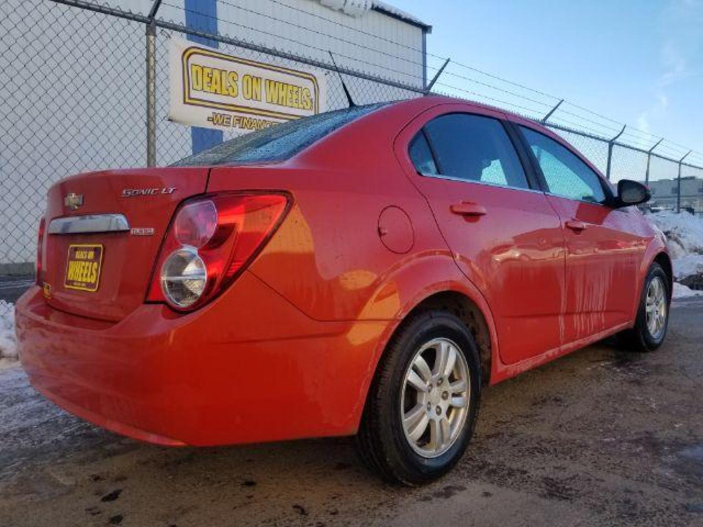 2013 Chevrolet Sonic LT Manual Sedan (1G1JD5SB1D4) with an 1.4L L4 DOHC 24V TURBO engine, 5-Speed Manual transmission, located at 1800 West Broadway, Missoula, 59808, (406) 543-1986, 46.881348, -114.023628 - Photo#4