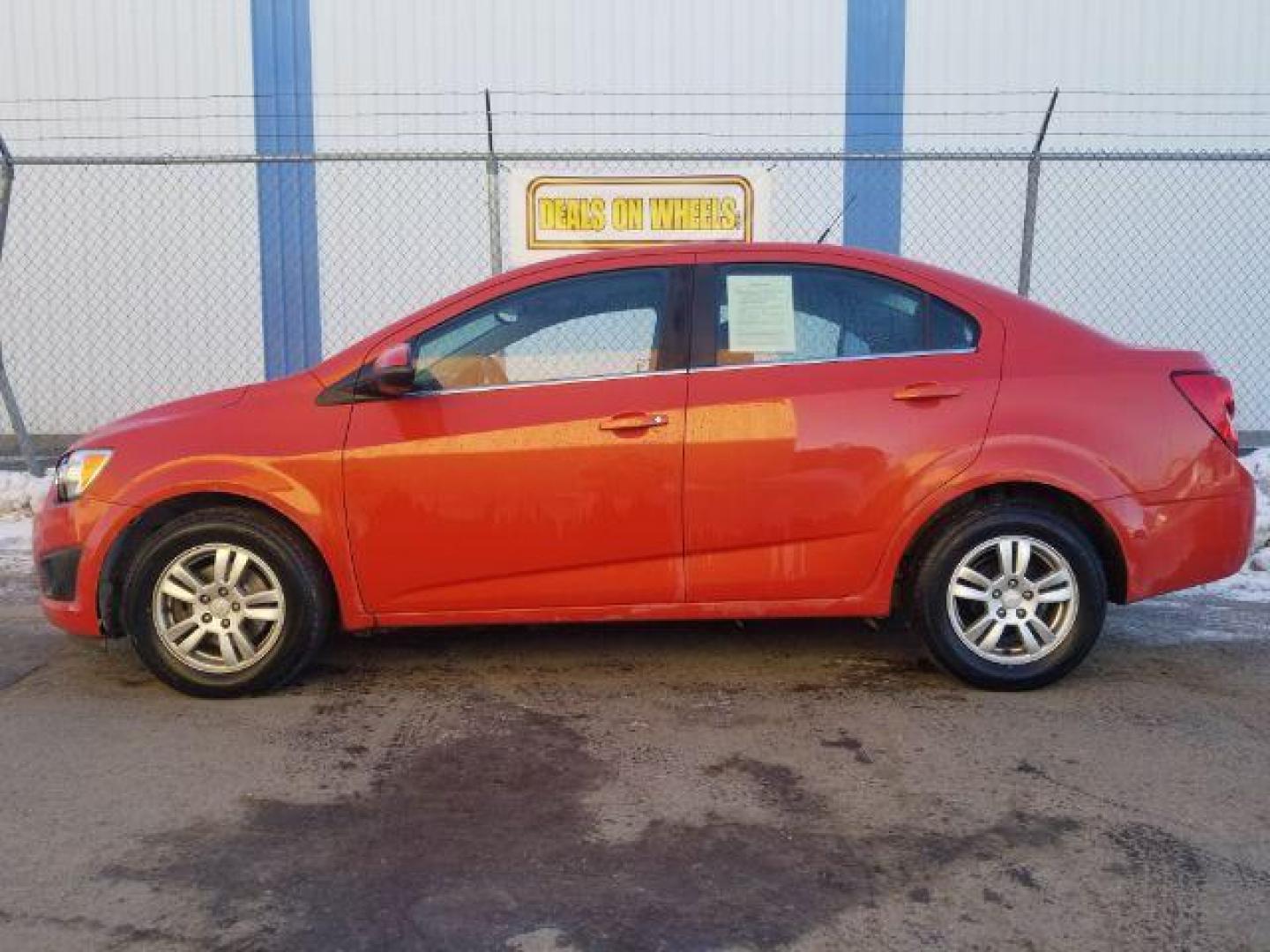 2013 Chevrolet Sonic LT Manual Sedan (1G1JD5SB1D4) with an 1.4L L4 DOHC 24V TURBO engine, 5-Speed Manual transmission, located at 1800 West Broadway, Missoula, 59808, (406) 543-1986, 46.881348, -114.023628 - Photo#6