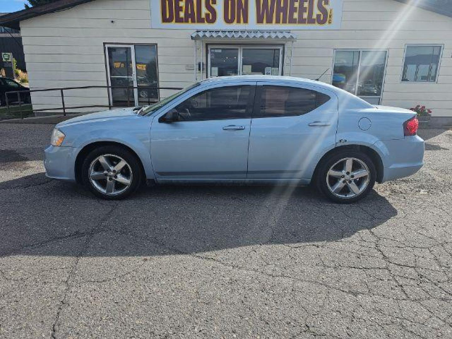 2013 Dodge Avenger Base (1C3CDZAB0DN) with an 2.4L L4 DOHC 16V engine, 4-Speed Automatic transmission, located at 4047 Montana Ave., Billings, MT, 59101, 45.770847, -108.529800 - Photo#5