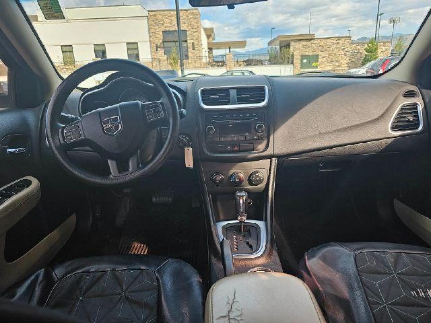 2013 Dodge Avenger Base (1C3CDZAB0DN) with an 2.4L L4 DOHC 16V engine, 4-Speed Automatic transmission, located at 4047 Montana Ave., Billings, MT, 59101, 45.770847, -108.529800 - Photo#6