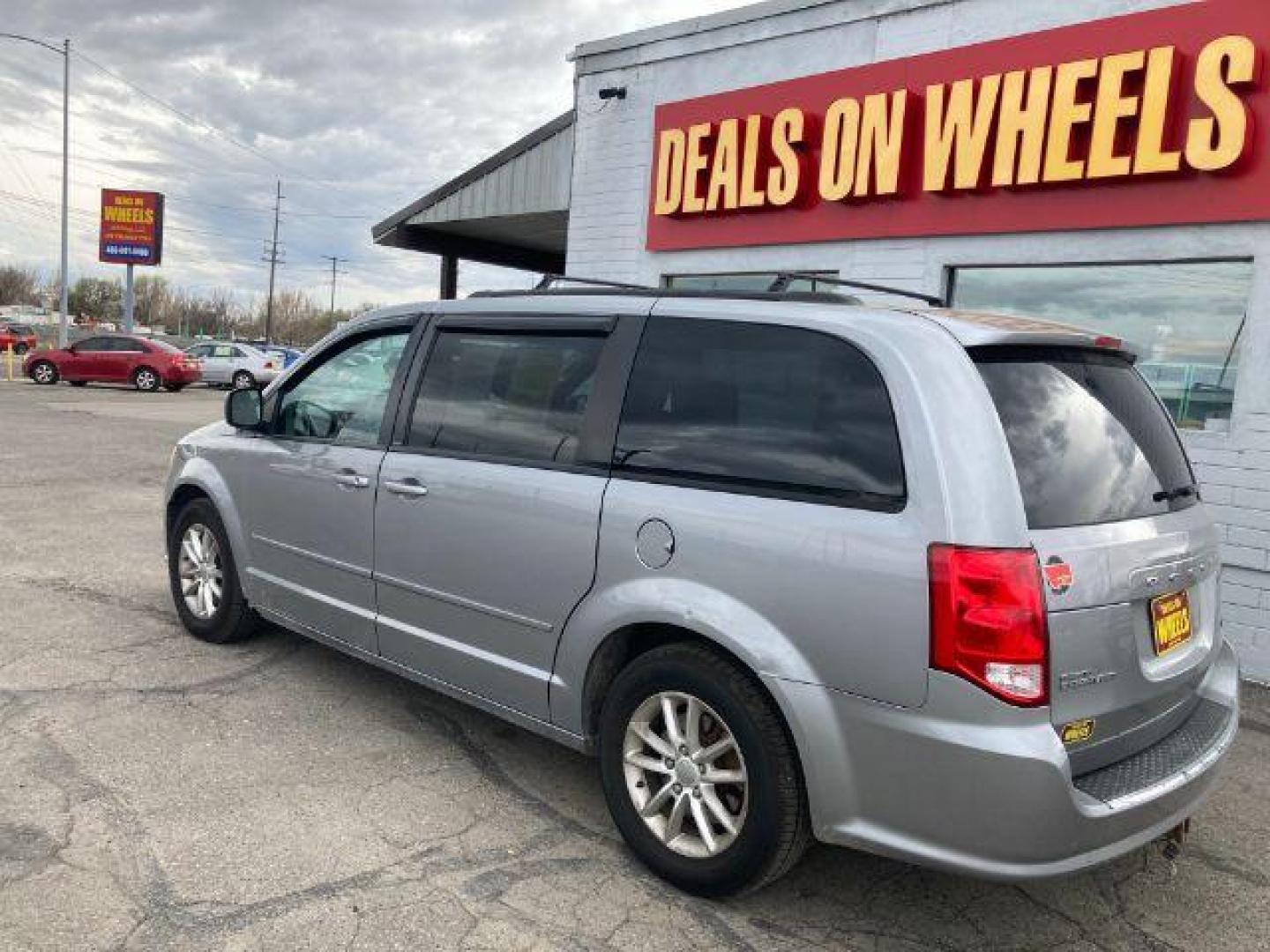 2013 Dodge Grand Caravan SXT (2C4RDGCG8DR) with an 3.6L V6 DOHC 24V engine, 6-Speed Automatic transmission, located at 4047 Montana Ave., Billings, MT, 59101, 45.770847, -108.529800 - Photo#1