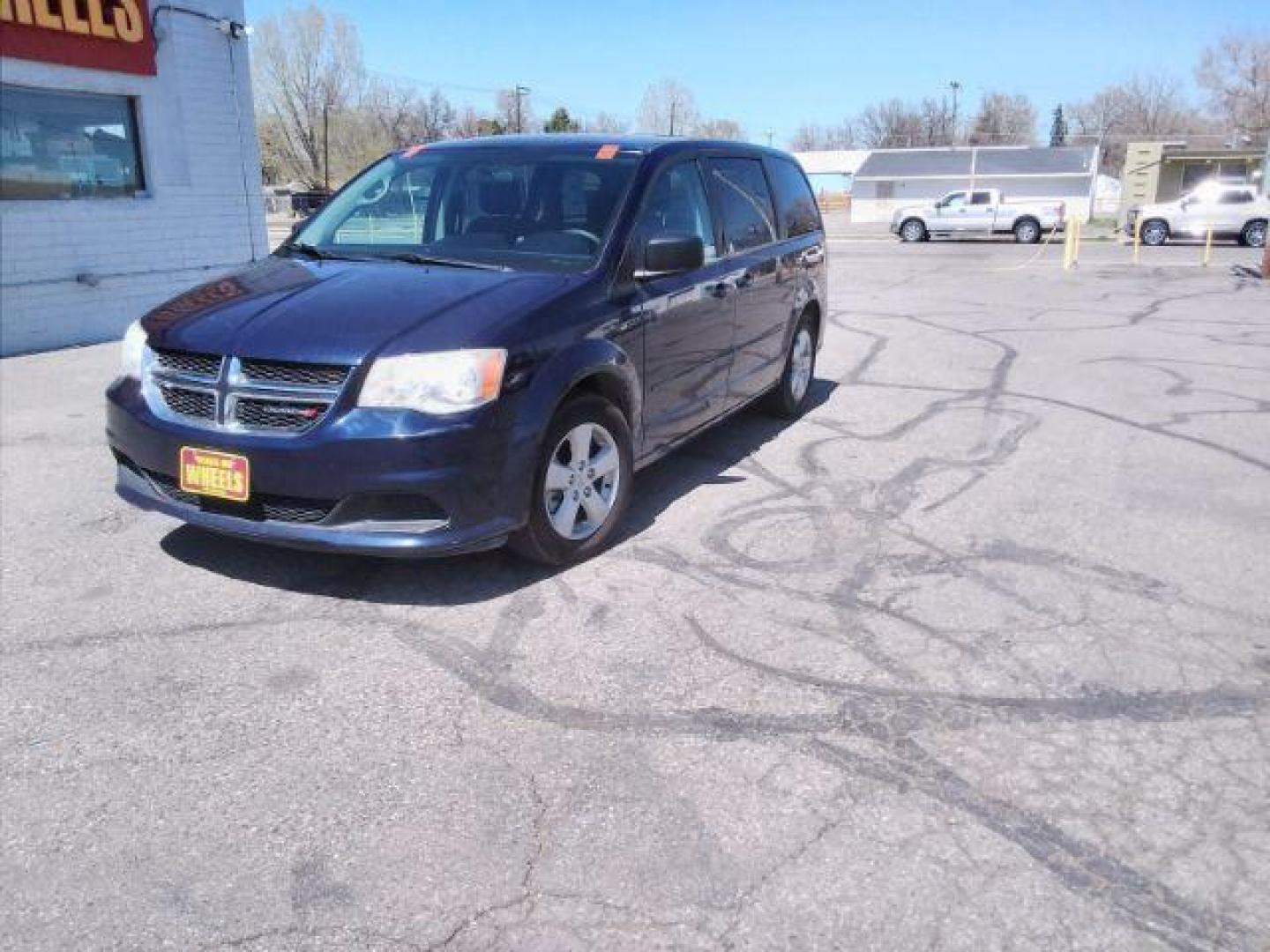 2013 Blue Streak Pearl Dodge Grand Caravan SE (2C4RDGBG5DR) with an 3.6L V6 DOHC 24V engine, 6-Speed Automatic transmission, located at 4047 Montana Ave., Billings, MT, 59101, 45.770847, -108.529800 - Photo#0