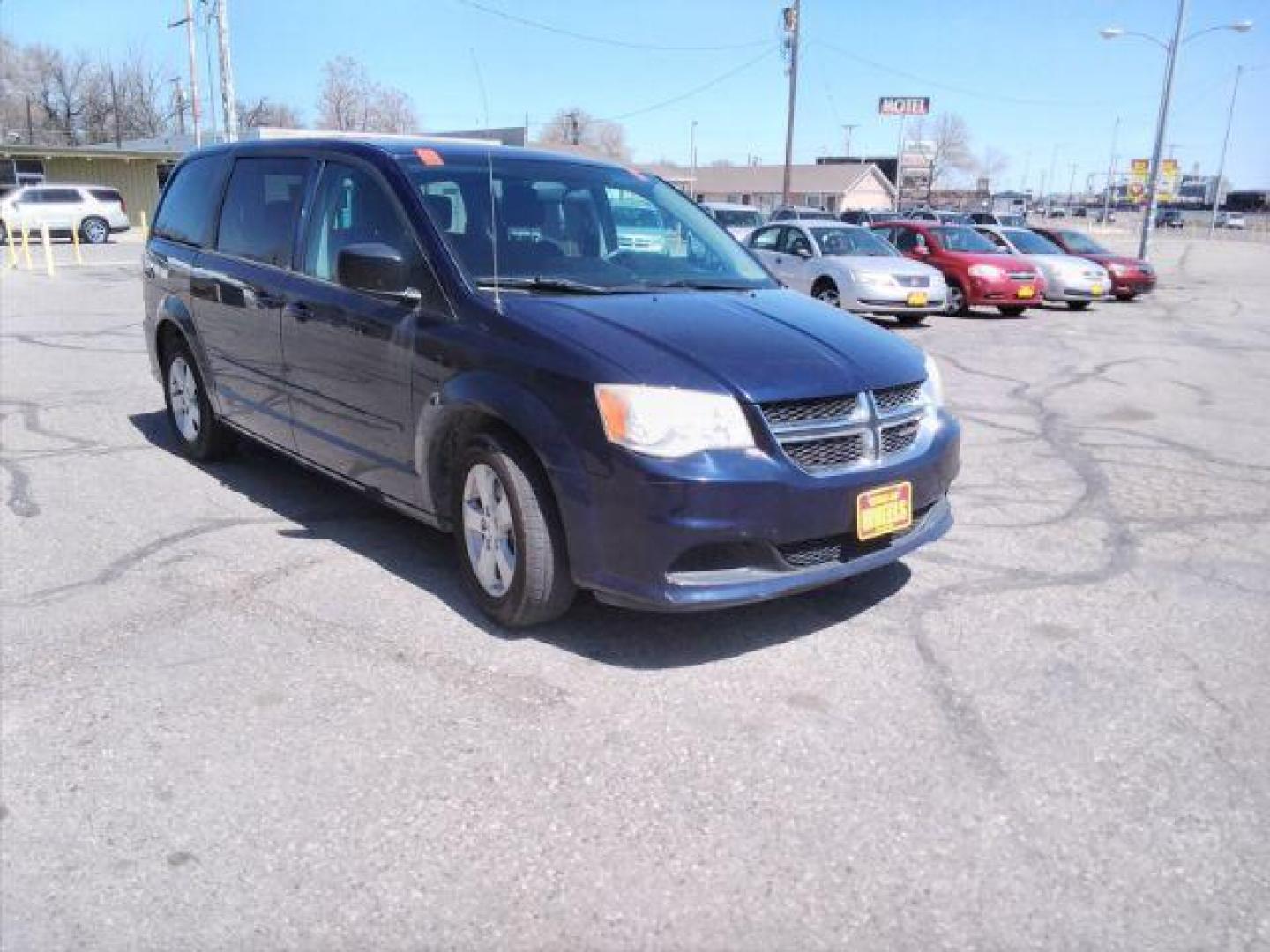 2013 Blue Streak Pearl Dodge Grand Caravan SE (2C4RDGBG5DR) with an 3.6L V6 DOHC 24V engine, 6-Speed Automatic transmission, located at 4047 Montana Ave., Billings, MT, 59101, 45.770847, -108.529800 - Photo#6