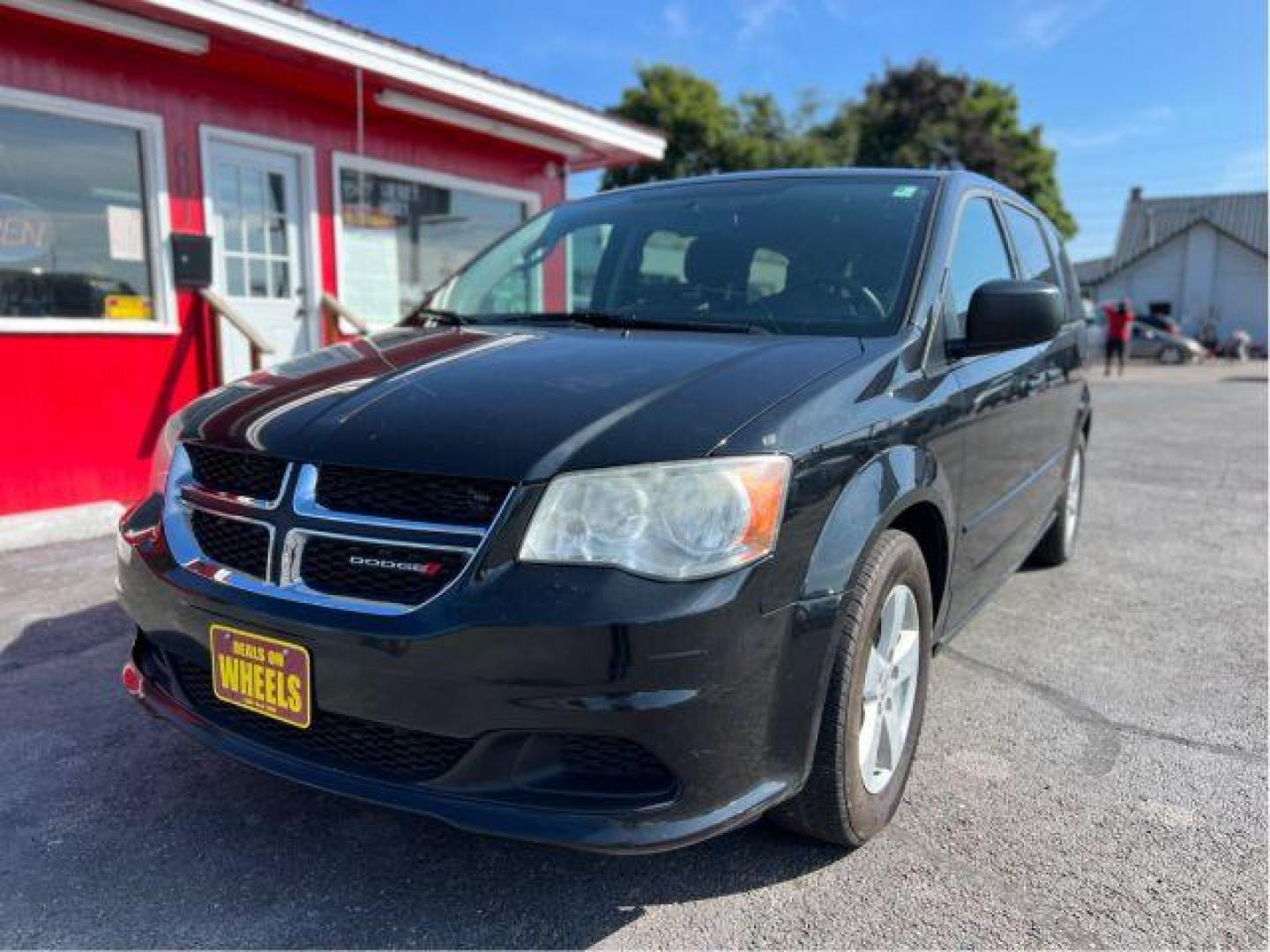 2013 Dodge Grand Caravan SE (2C4RDGBG5DR) with an 3.6L V6 DOHC 24V engine, 6-Speed Automatic transmission, located at 601 E. Idaho St., Kalispell, MT, 59901, (406) 300-4664, 0.000000, 0.000000 - Photo#0