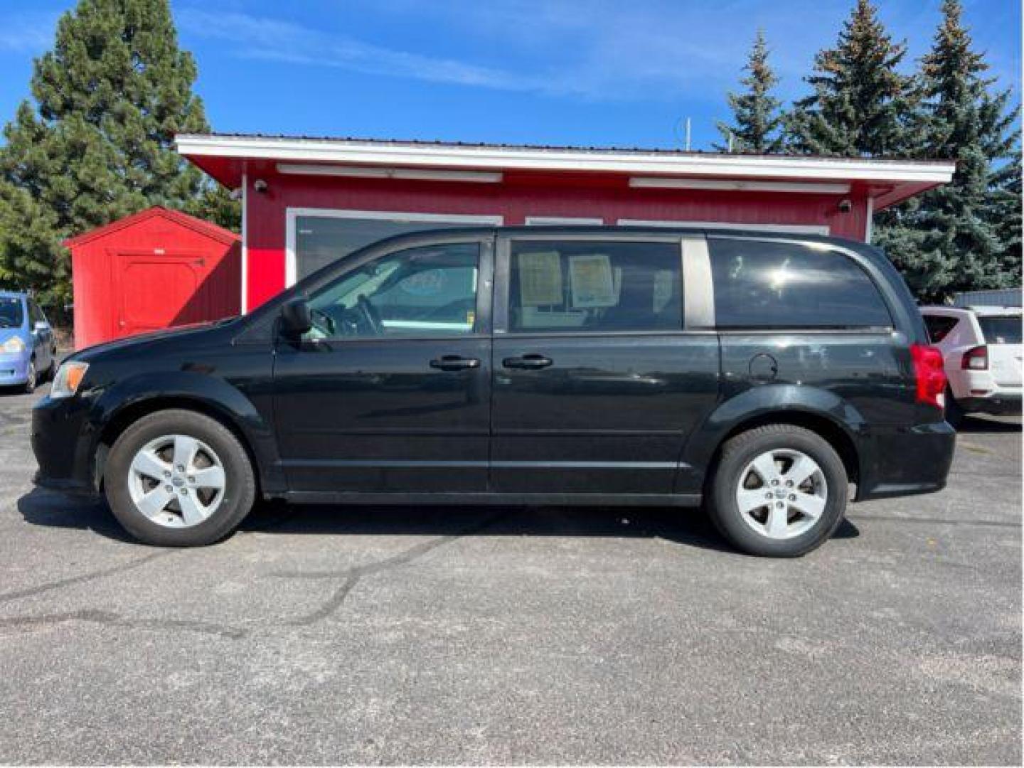 2013 Dodge Grand Caravan SE (2C4RDGBG5DR) with an 3.6L V6 DOHC 24V engine, 6-Speed Automatic transmission, located at 601 E. Idaho St., Kalispell, MT, 59901, (406) 300-4664, 0.000000, 0.000000 - Photo#1