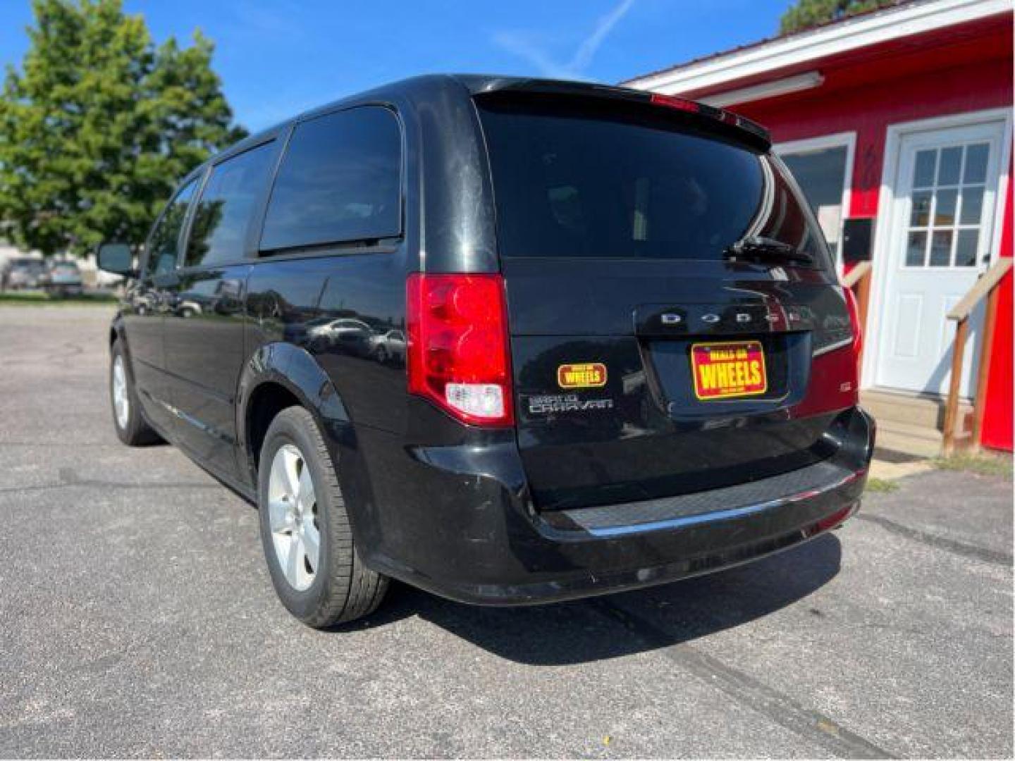 2013 Dodge Grand Caravan SE (2C4RDGBG5DR) with an 3.6L V6 DOHC 24V engine, 6-Speed Automatic transmission, located at 601 E. Idaho St., Kalispell, MT, 59901, (406) 300-4664, 0.000000, 0.000000 - Photo#2