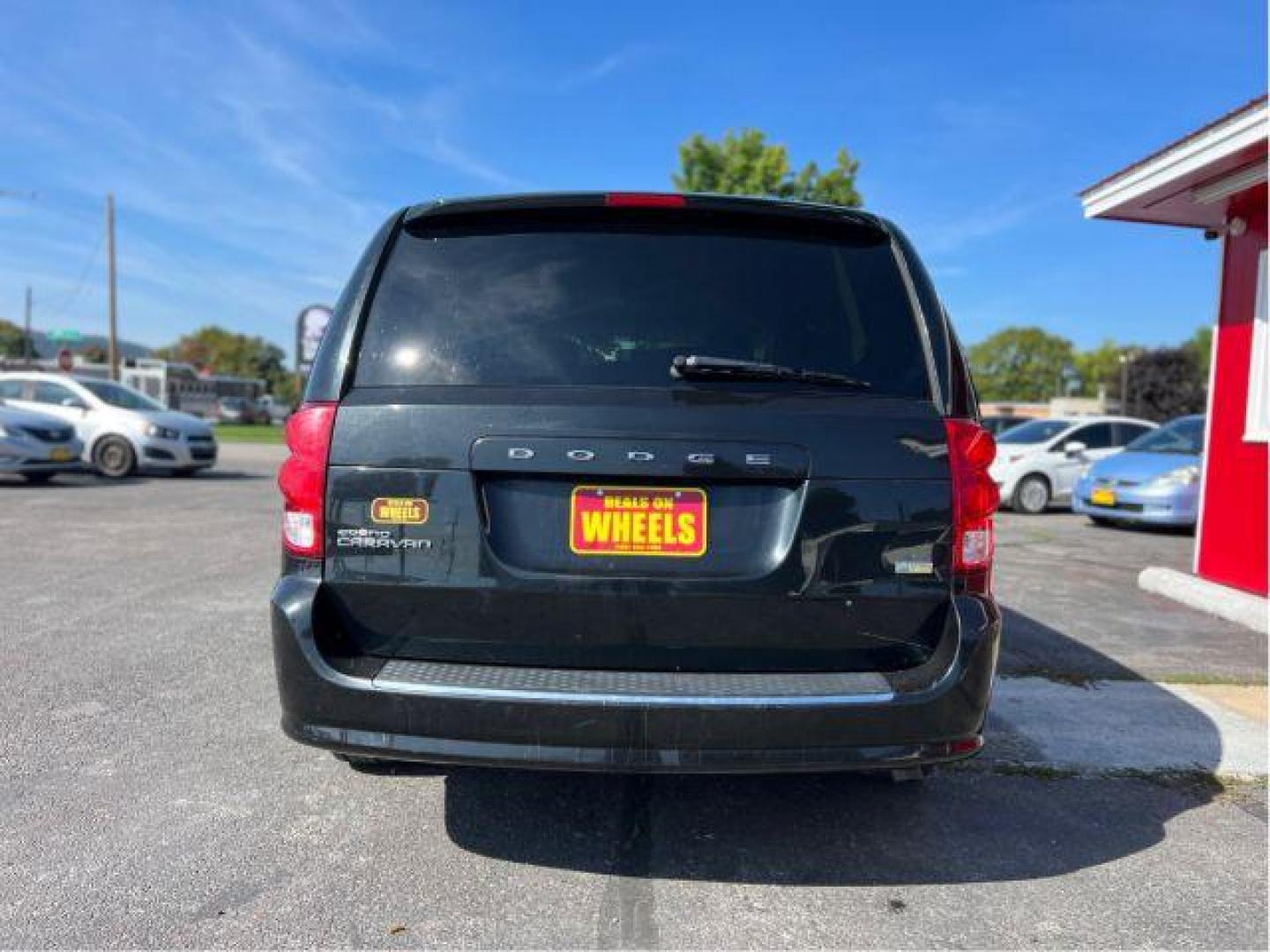 2013 Dodge Grand Caravan SE (2C4RDGBG5DR) with an 3.6L V6 DOHC 24V engine, 6-Speed Automatic transmission, located at 601 E. Idaho St., Kalispell, MT, 59901, (406) 300-4664, 0.000000, 0.000000 - Photo#3