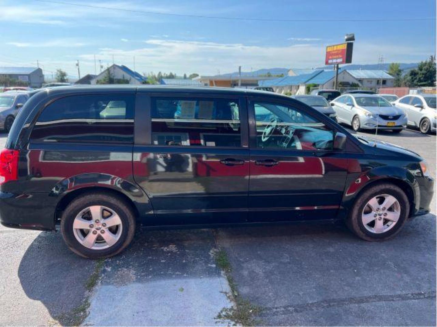 2013 Dodge Grand Caravan SE (2C4RDGBG5DR) with an 3.6L V6 DOHC 24V engine, 6-Speed Automatic transmission, located at 601 E. Idaho St., Kalispell, MT, 59901, (406) 300-4664, 0.000000, 0.000000 - Photo#5