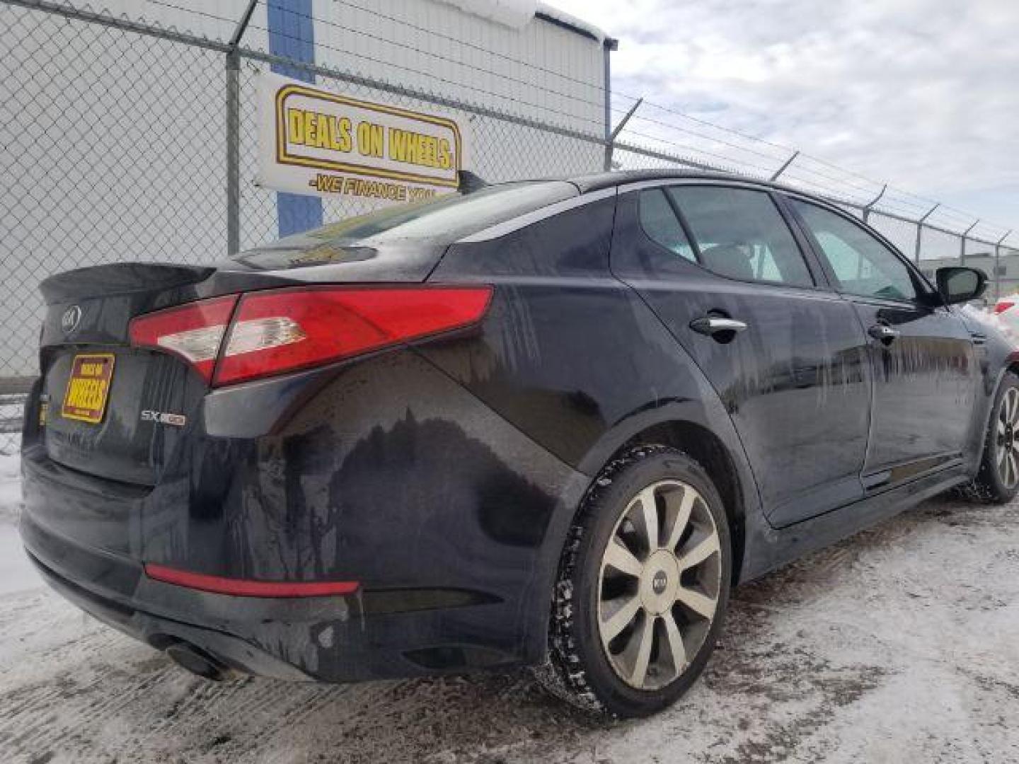 2013 Kia Optima SX (5XXGR4A63DG) with an 2.0L L4 DOHC 16V TURBO engine, 6-Speed Automatic transmission, located at 4801 10th Ave S,, Great Falls, MT, 59405, 0.000000, 0.000000 - Photo#4