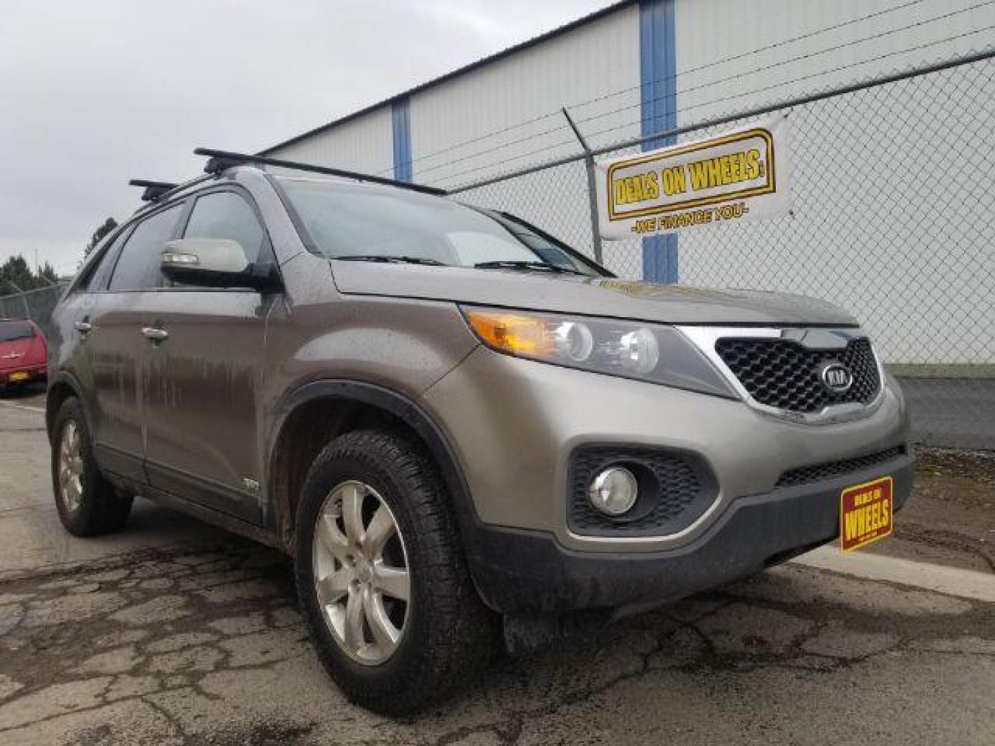 2013 Kia Sorento LX 4WD (5XYKTCA67DG) with an 2.4L L4 DOHC 16V engine, 6-Speed Automatic transmission, located at 601 E. Idaho St., Kalispell, MT, 59901, (406) 300-4664, 0.000000, 0.000000 - Photo#2