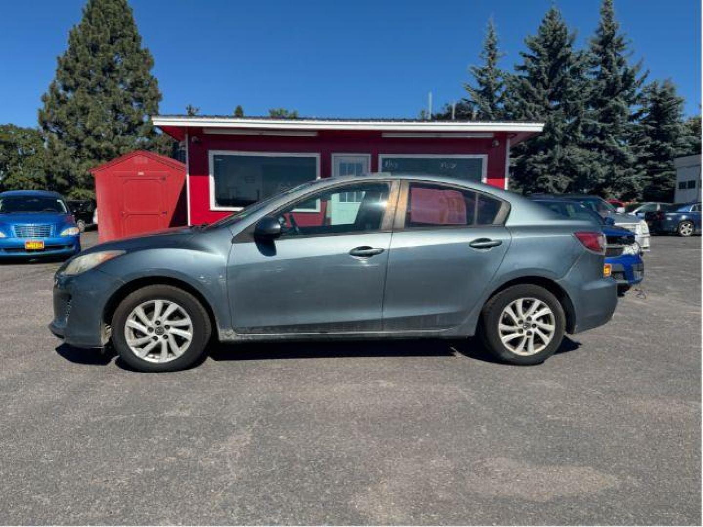 2013 Mazda MAZDA3 i SV MT 4-Door (JM1BL1TGXD1) with an 2.0L L4 DOHC 16V engine, 5-Speed Manual transmission, located at 601 E. Idaho St., Kalispell, MT, 59901, (406) 300-4664, 0.000000, 0.000000 - Photo#1