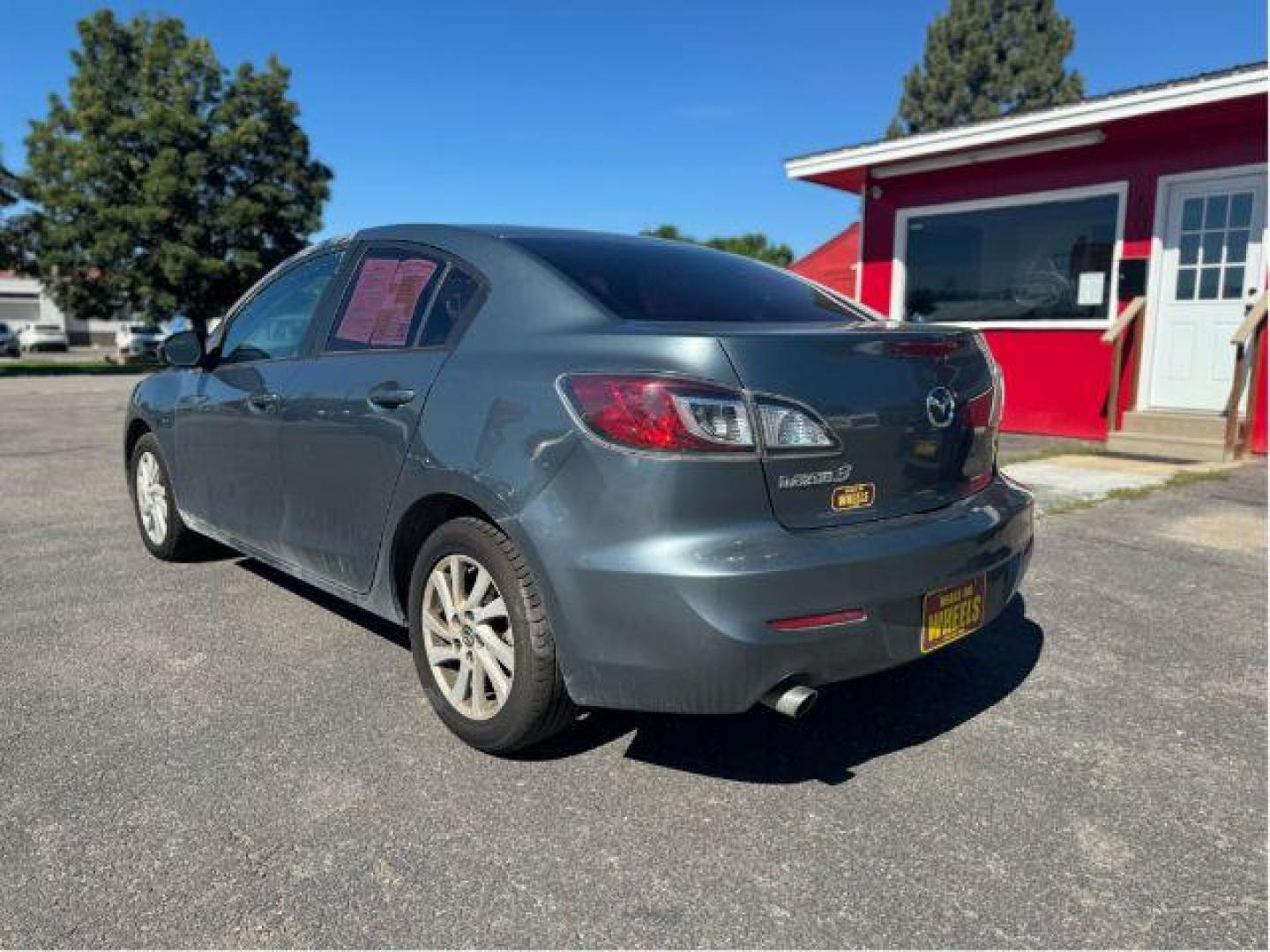 2013 Mazda MAZDA3 i SV MT 4-Door (JM1BL1TGXD1) with an 2.0L L4 DOHC 16V engine, 5-Speed Manual transmission, located at 601 E. Idaho St., Kalispell, MT, 59901, (406) 300-4664, 0.000000, 0.000000 - Photo#2