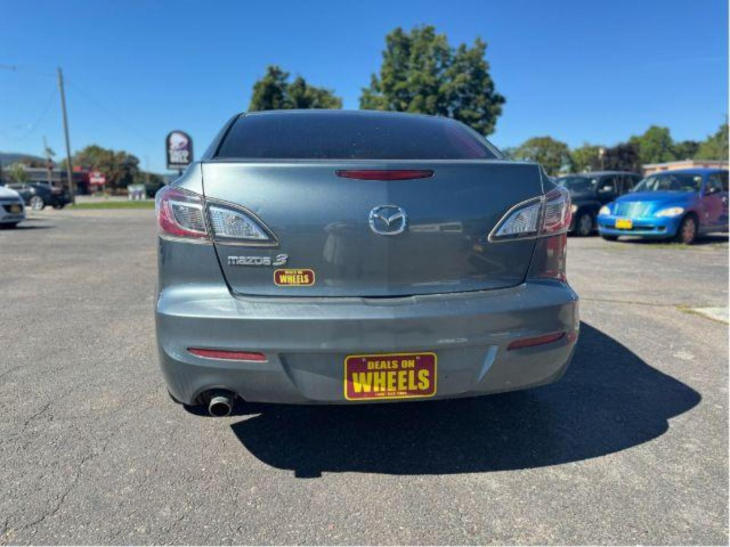 2013 Mazda MAZDA3 i SV MT 4-Door (JM1BL1TGXD1) with an 2.0L L4 DOHC 16V engine, 5-Speed Manual transmission, located at 601 E. Idaho St., Kalispell, MT, 59901, (406) 300-4664, 0.000000, 0.000000 - Photo#3