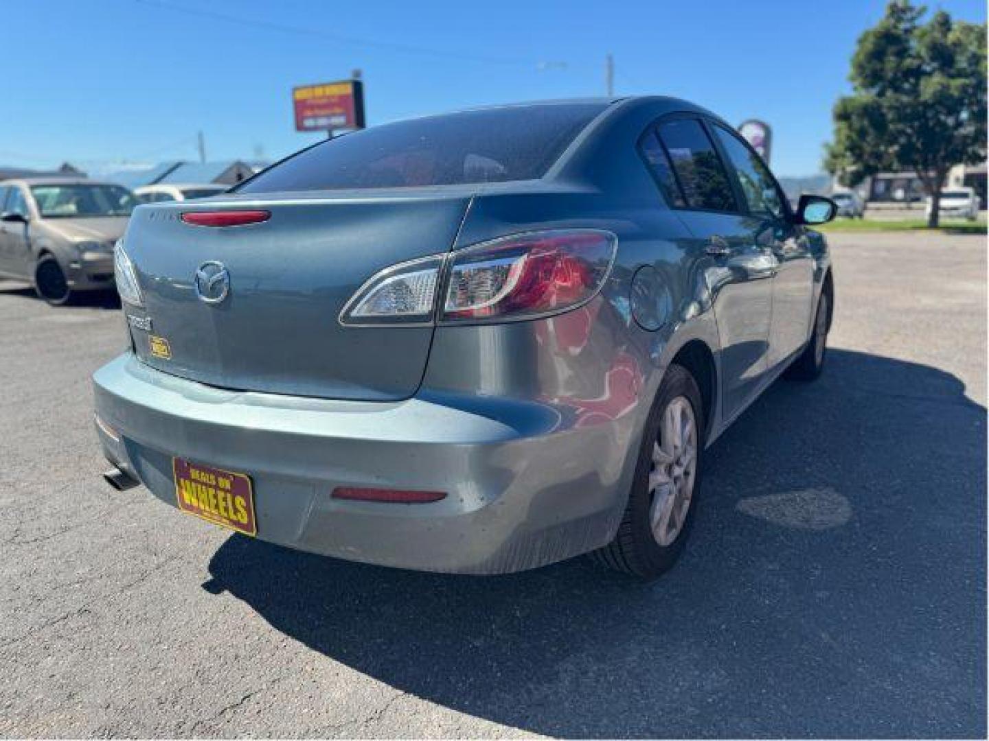 2013 Mazda MAZDA3 i SV MT 4-Door (JM1BL1TGXD1) with an 2.0L L4 DOHC 16V engine, 5-Speed Manual transmission, located at 601 E. Idaho St., Kalispell, MT, 59901, (406) 300-4664, 0.000000, 0.000000 - Photo#4