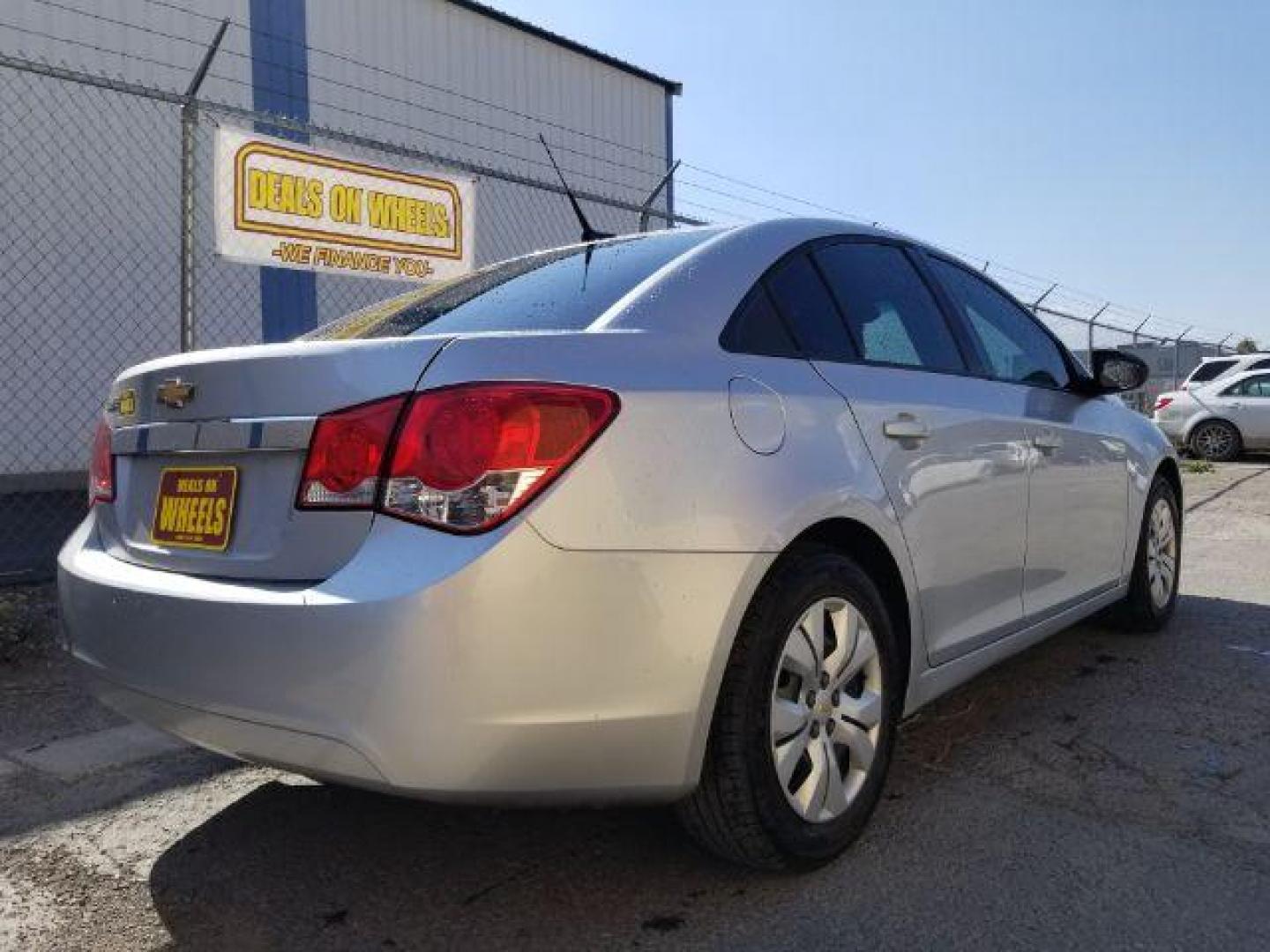 2014 Chevrolet Cruze LS Manual (1G1PB5SG4E7) with an 1.8L L4 DOHC 16V engine, 6-Speed Manual transmission, located at 4047 Montana Ave., Billings, MT, 59101, 45.770847, -108.529800 - Photo#4