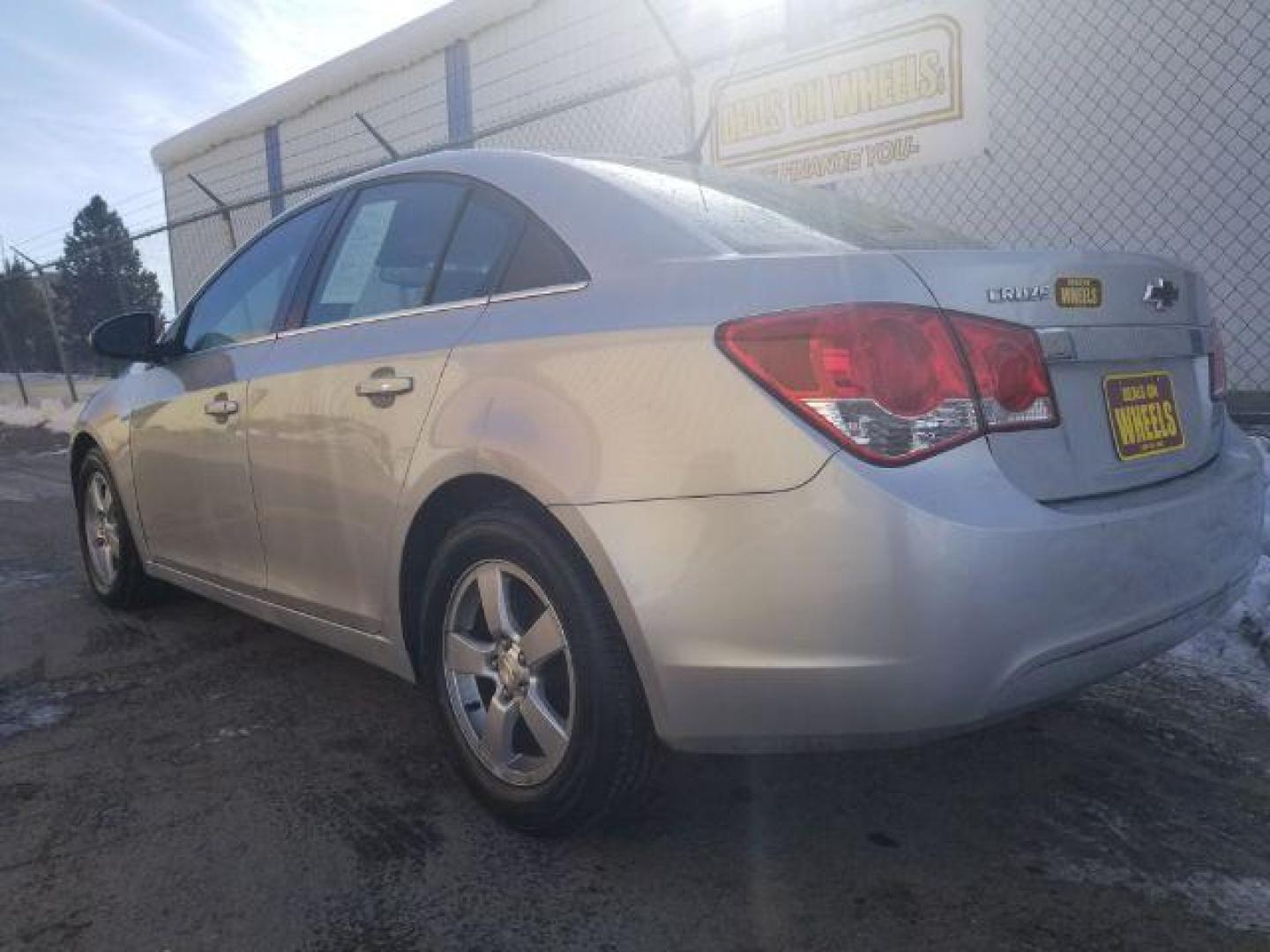 2014 Chevrolet Cruze 1LT Auto (1G1PC5SB5E7) with an 1.4L L4 DOHC 16V TURBO engine, 6-Speed Automatic transmission, located at 4047 Montana Ave., Billings, MT, 59101, 45.770847, -108.529800 - Photo#5