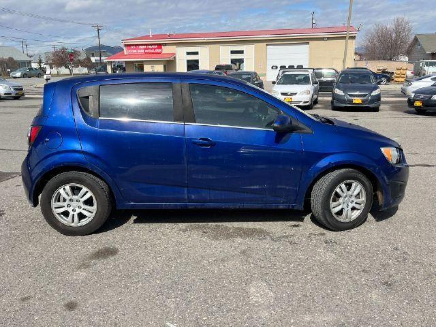 2014 Chevrolet Sonic LT Auto 5-Door (1G1JC6SG9E4) with an 1.8L L4 DOHC 24V engine, 6-Speed Automatic transmission, located at 1821 N Montana Ave., Helena, MT, 59601, 0.000000, 0.000000 - Photo#3