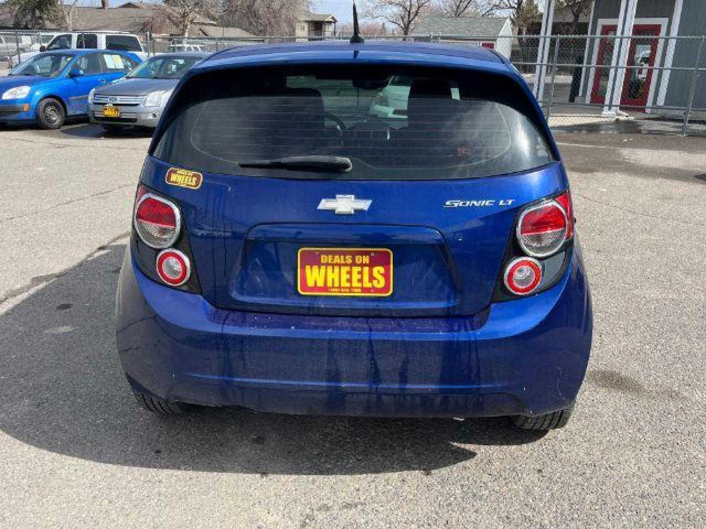 2014 Chevrolet Sonic LT Auto 5-Door (1G1JC6SG9E4) with an 1.8L L4 DOHC 24V engine, 6-Speed Automatic transmission, located at 1821 N Montana Ave., Helena, MT, 59601, 0.000000, 0.000000 - Photo#4