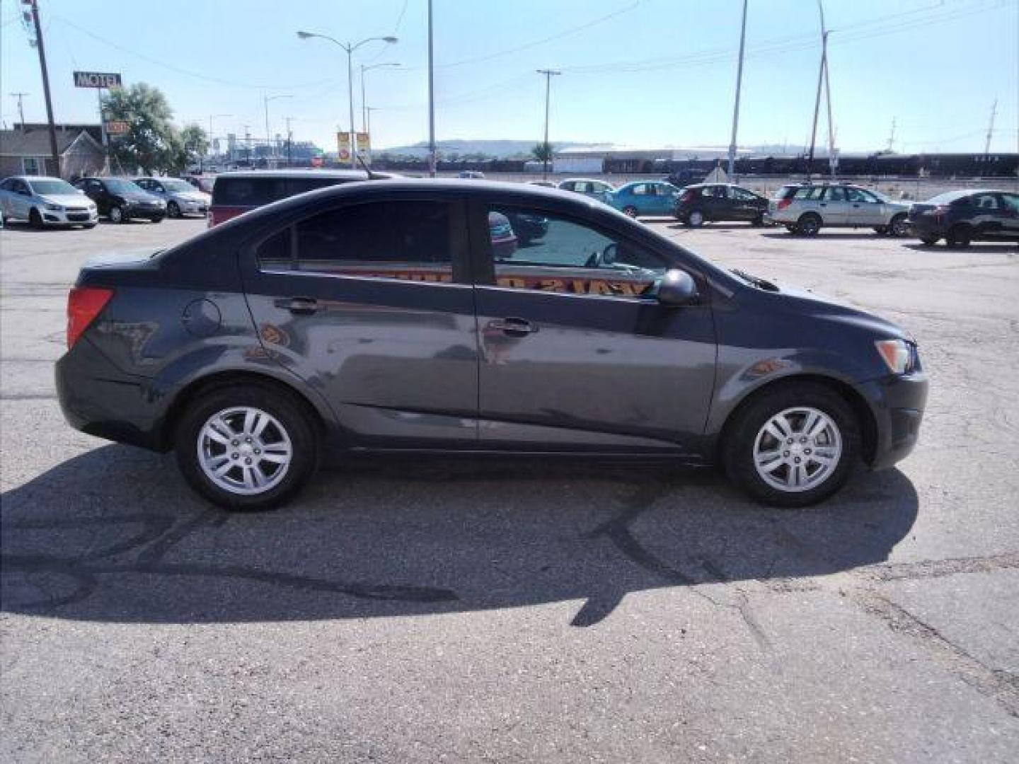 2014 Chevrolet Sonic LT Auto Sedan (1G1JC5SH9E4) with an 1.8L L4 DOHC 24V engine, 6-Speed Automatic transmission, located at 4047 Montana Ave., Billings, MT, 59101, 45.770847, -108.529800 - Photo#5