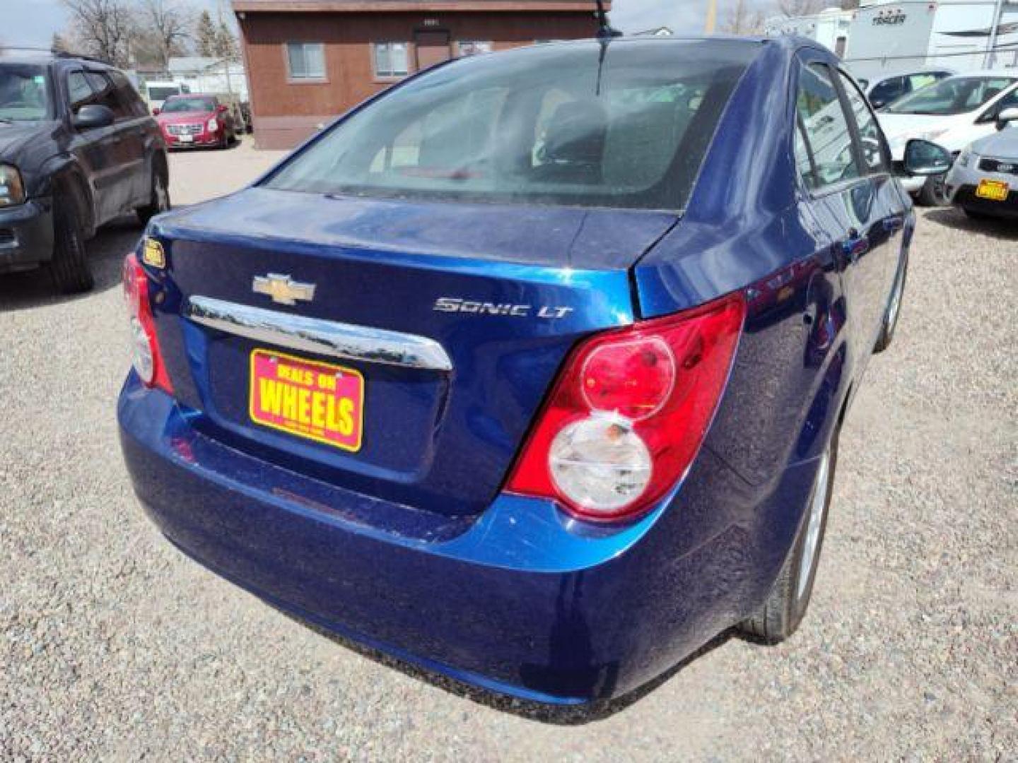 2014 Chevrolet Sonic LT Auto Sedan (1G1JC5SH6E4) with an 1.8L L4 DOHC 24V engine, 6-Speed Automatic transmission, located at 4801 10th Ave S,, Great Falls, MT, 59405, 0.000000, 0.000000 - Photo#4