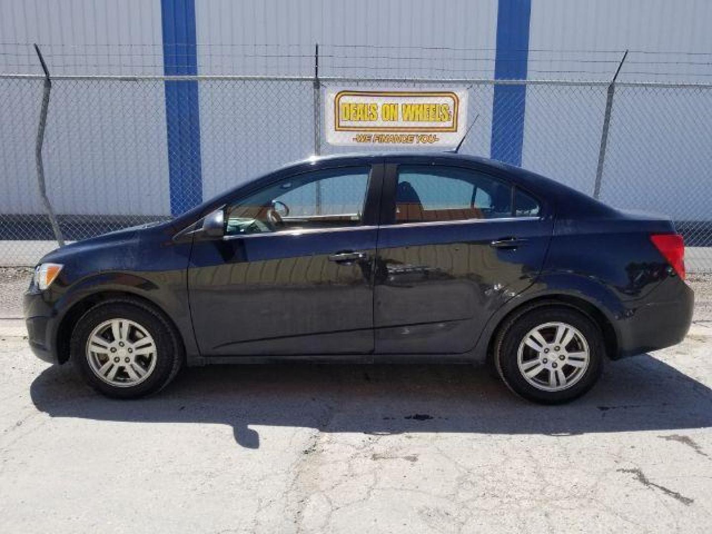 2014 Chevrolet Sonic LT Auto Sedan (1G1JC5SH7E4) with an 1.8L L4 DOHC 24V engine, 6-Speed Automatic transmission, located at 1821 N Montana Ave., Helena, MT, 59601, 0.000000, 0.000000 - Photo#12