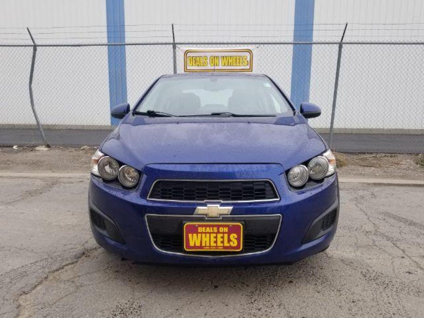 2014 Chevrolet Sonic LT Auto Sedan (1G1JC5SH7E4) with an 1.8L L4 DOHC 24V engine, 6-Speed Automatic transmission, located at 601 E. Idaho St., Kalispell, MT, 59901, (406) 300-4664, 0.000000, 0.000000 - Photo#1