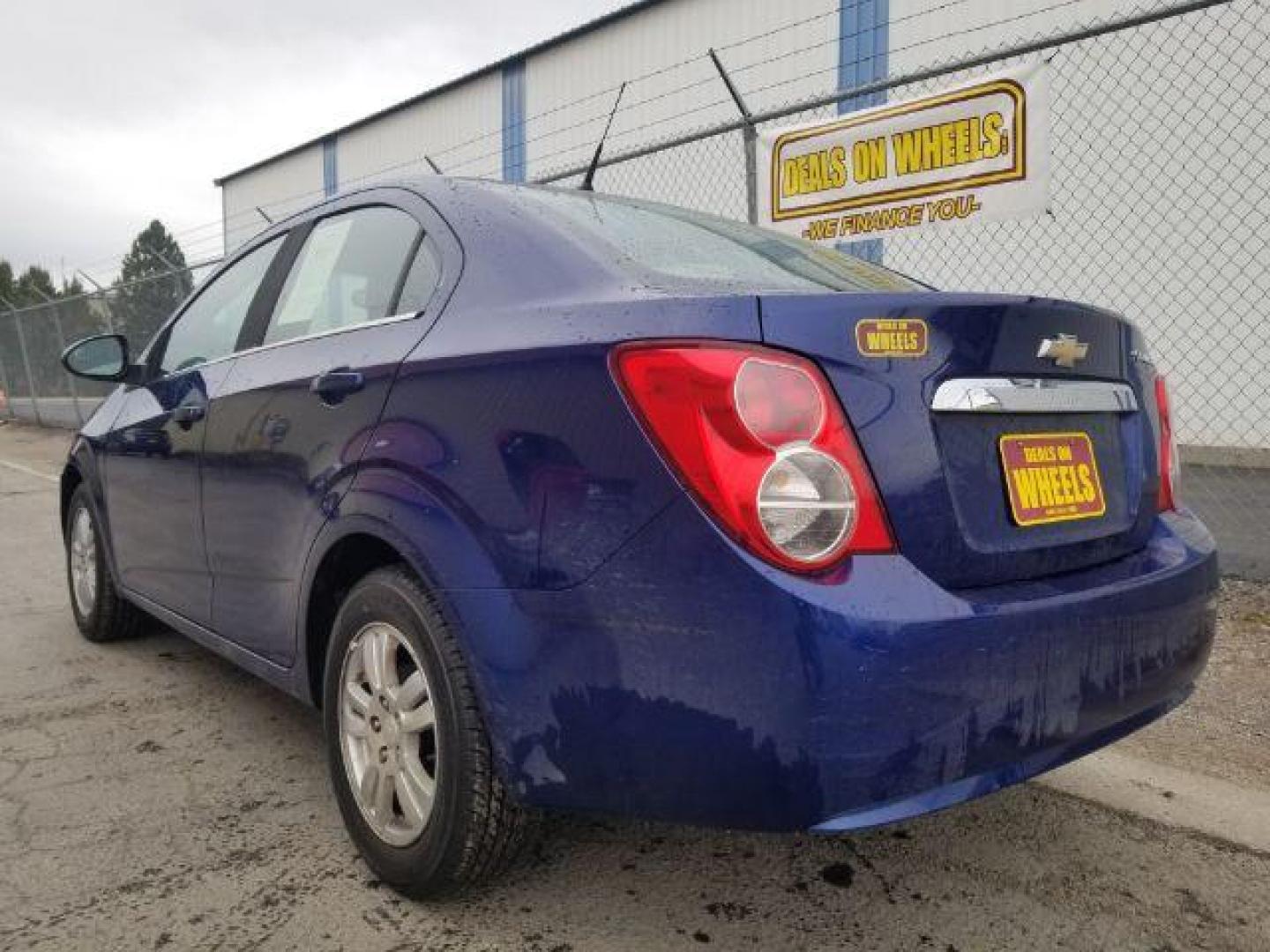 2014 Chevrolet Sonic LT Auto Sedan (1G1JC5SH7E4) with an 1.8L L4 DOHC 24V engine, 6-Speed Automatic transmission, located at 601 E. Idaho St., Kalispell, MT, 59901, (406) 300-4664, 0.000000, 0.000000 - Photo#5