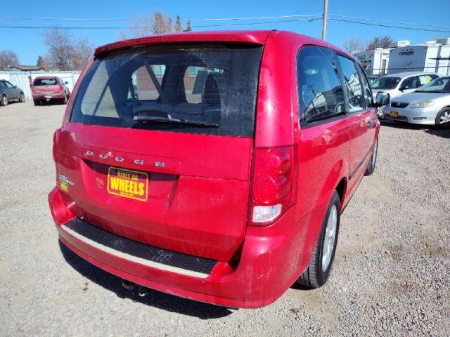 2014 Dodge Grand Caravan SE (2C4RDGBG2ER) with an 3.6L V6 DOHC 24V engine, 6-Speed Automatic transmission, located at 4801 10th Ave S,, Great Falls, MT, 59405, 0.000000, 0.000000 - Photo#4