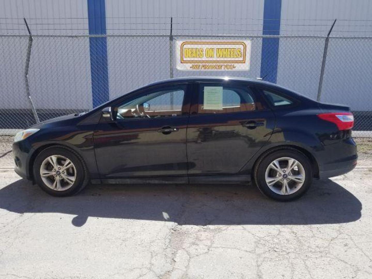 2014 Ford Focus SE Sedan (1FADP3F20EL) with an 2.0L L4 DOHC 16V engine, located at 4801 10th Ave S,, Great Falls, MT, 59405, 0.000000, 0.000000 - Photo#12