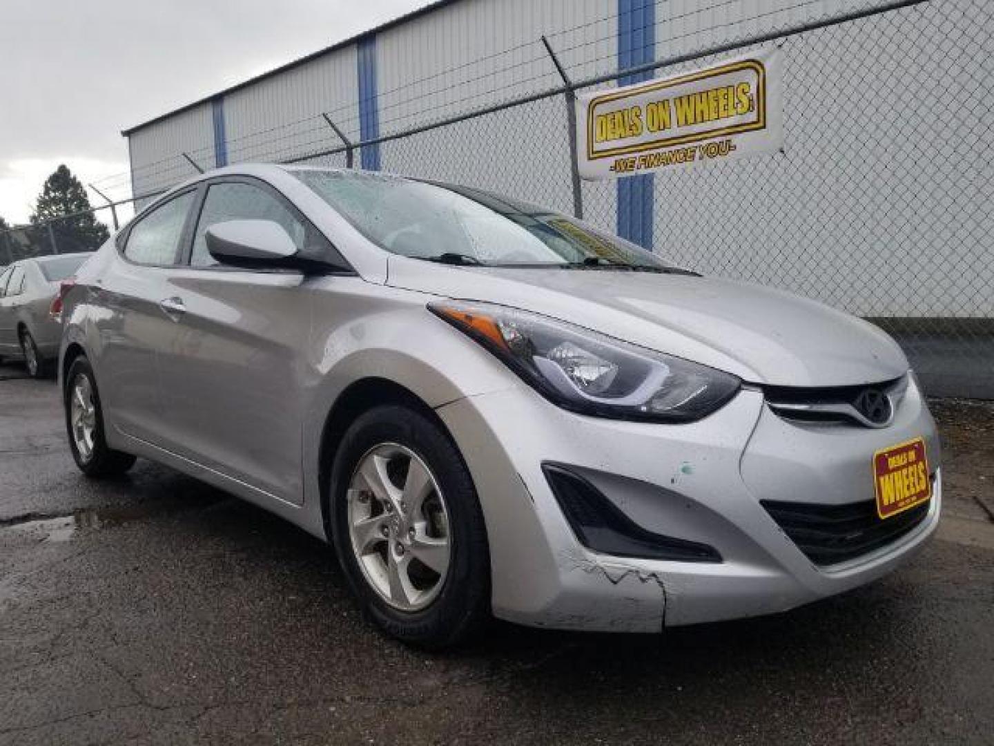 2014 Hyundai Elantra GLS A/T (5NPDH4AE6EH) with an 1.8L L4 DOHC 16V engine, 6-Speed Automatic transmission, located at 4047 Montana Ave., Billings, MT, 59101, 45.770847, -108.529800 - Photo#2