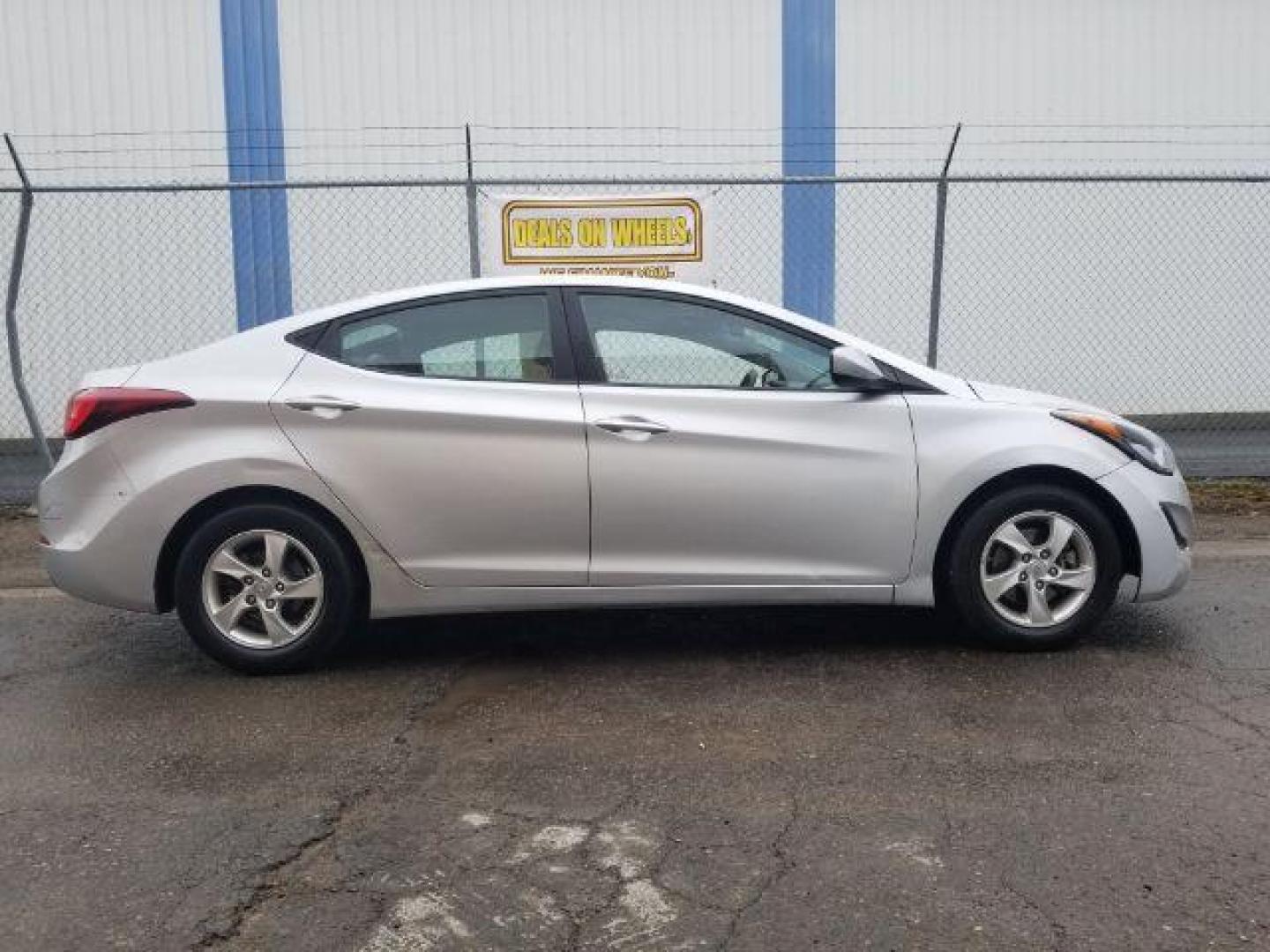 2014 Hyundai Elantra GLS A/T (5NPDH4AE6EH) with an 1.8L L4 DOHC 16V engine, 6-Speed Automatic transmission, located at 4047 Montana Ave., Billings, MT, 59101, 45.770847, -108.529800 - Photo#3