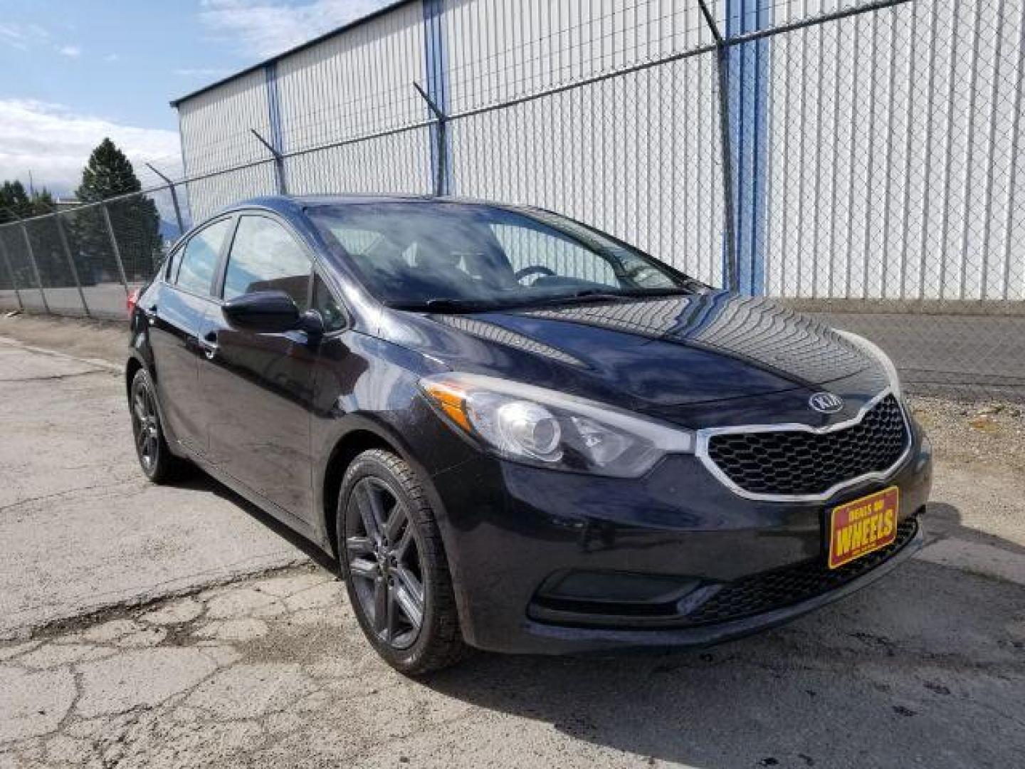 2014 Kia Forte LX M6 (KNAFK4A67E5) with an 1.8L L4 DOHC 16V engine, 6-Speed Manual transmission, located at 4047 Montana Ave., Billings, MT, 59101, 45.770847, -108.529800 - Photo#7