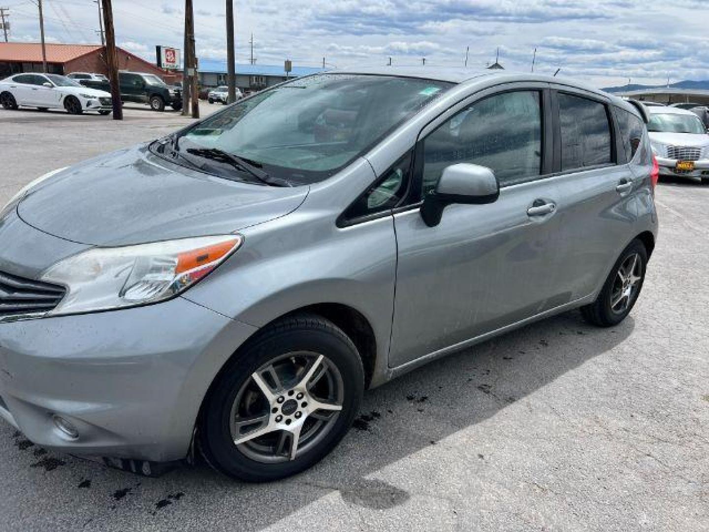 2014 Nissan Versa Note S (3N1CE2CPXEL) with an 1.6L L4 DOHC 16V engine, 5-Speed Manual transmission, located at 601 E. Idaho St., Kalispell, MT, 59901, (406) 300-4664, 0.000000, 0.000000 - Photo#0